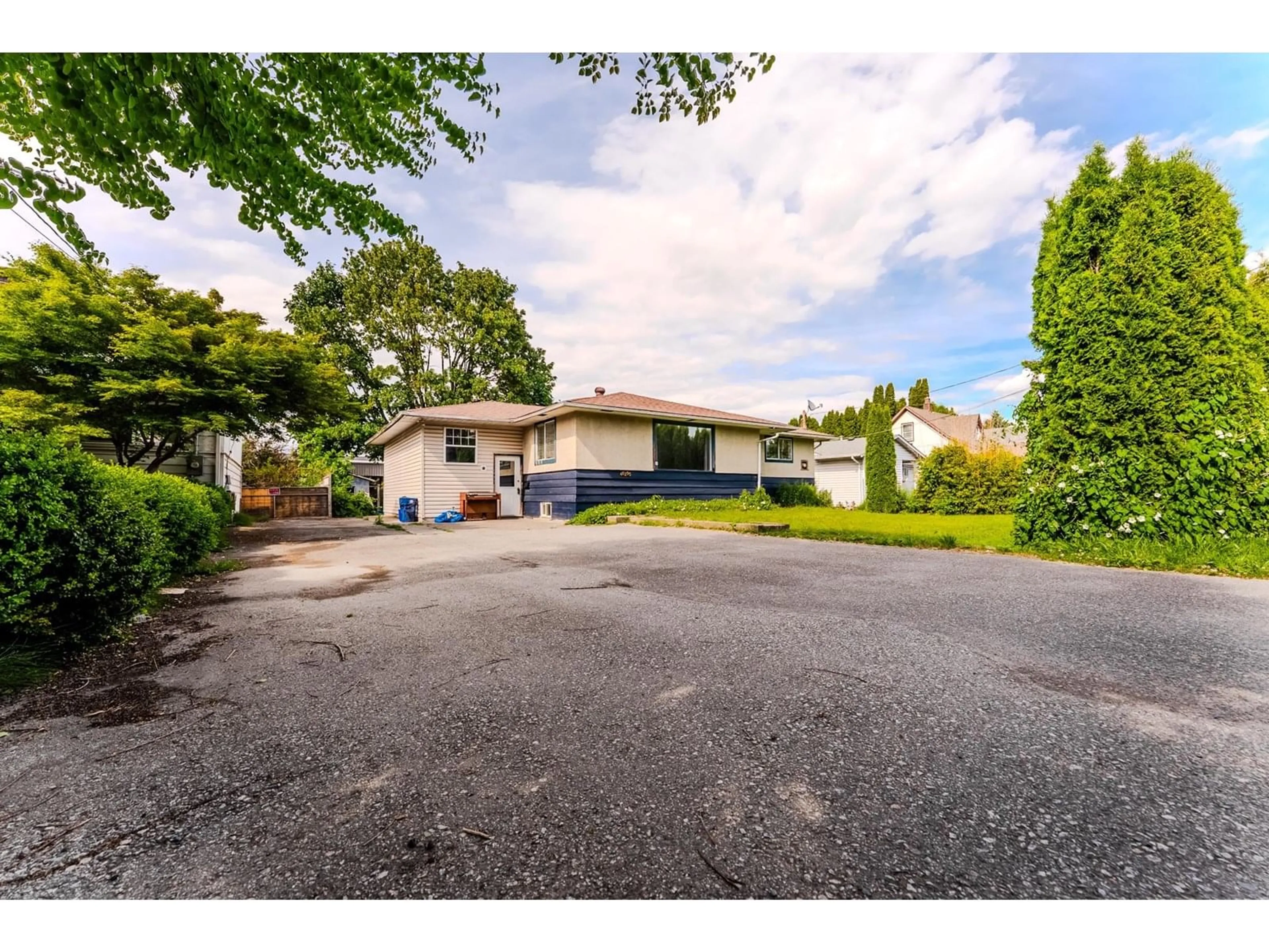 A pic from outside/outdoor area/front of a property/back of a property/a pic from drone, street for 46295 CHILLIWACK CENTRAL ROAD, Chilliwack British Columbia V2P1J7