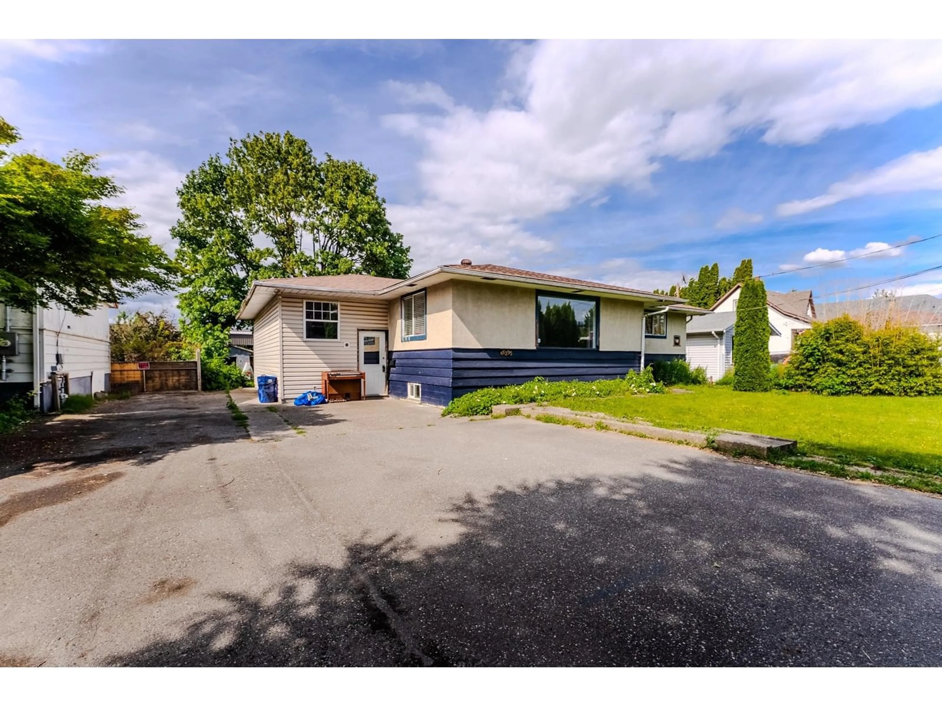 A pic from outside/outdoor area/front of a property/back of a property/a pic from drone, street for 46295 CHILLIWACK CENTRAL ROAD, Chilliwack British Columbia V2P1J7