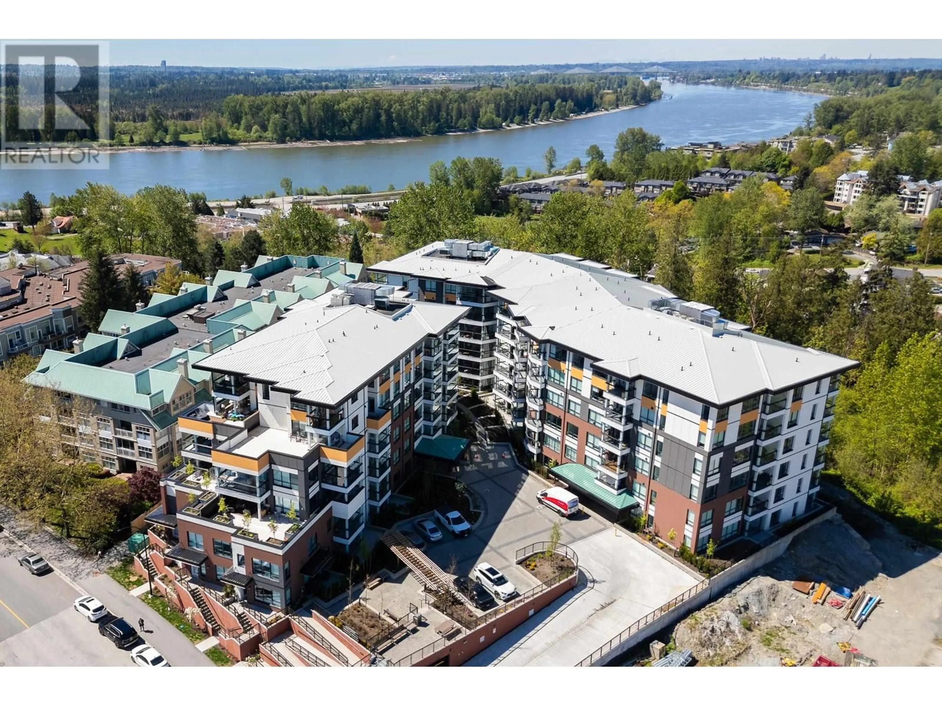 A pic from outside/outdoor area/front of a property/back of a property/a pic from drone, water/lake/river/ocean view for 101 - 11641 227 STREET, Maple Ridge British Columbia V2X9J6