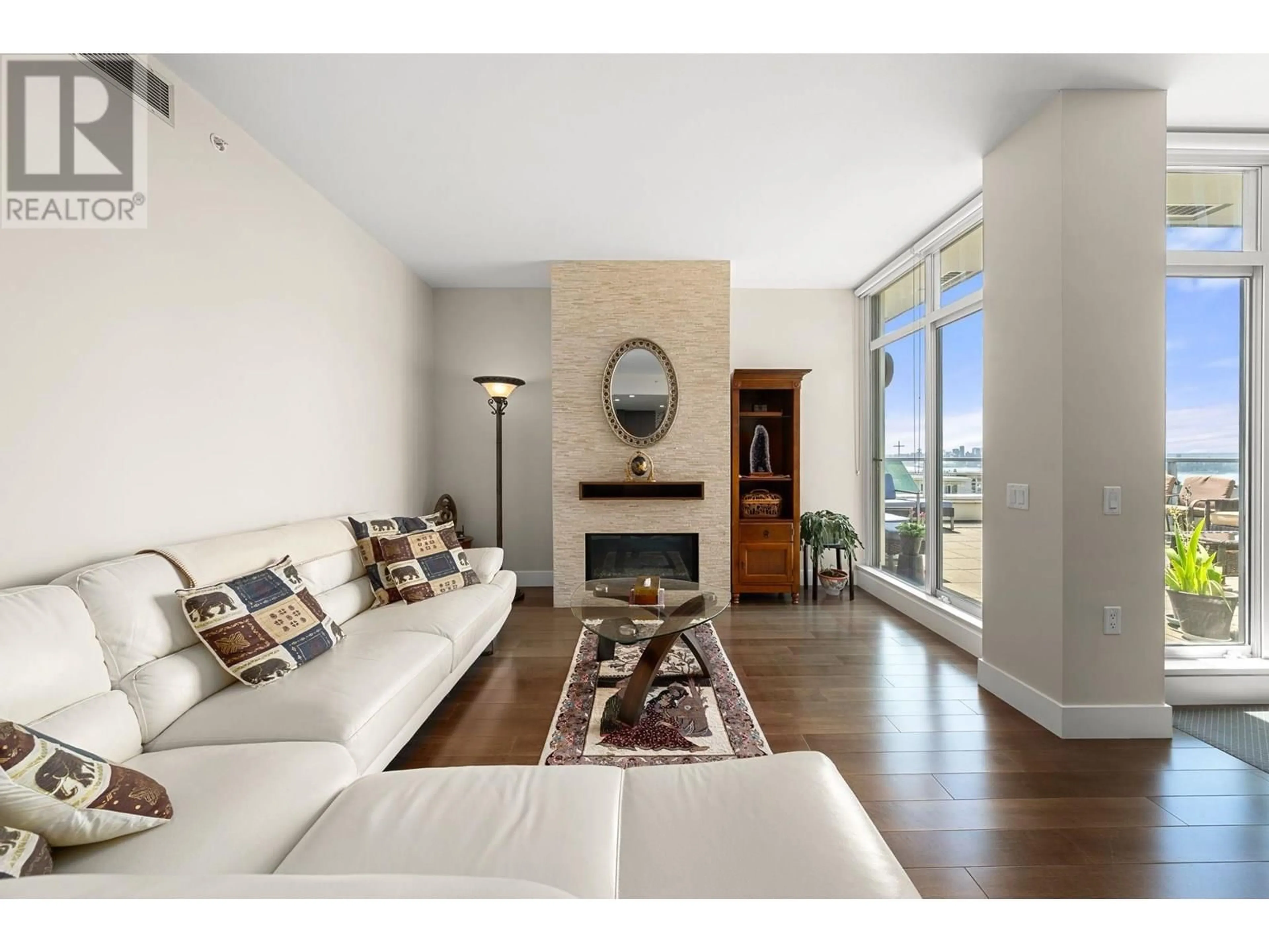 Living room with furniture, unknown for 501 - 210 13TH STREET, North Vancouver British Columbia V7M1N7