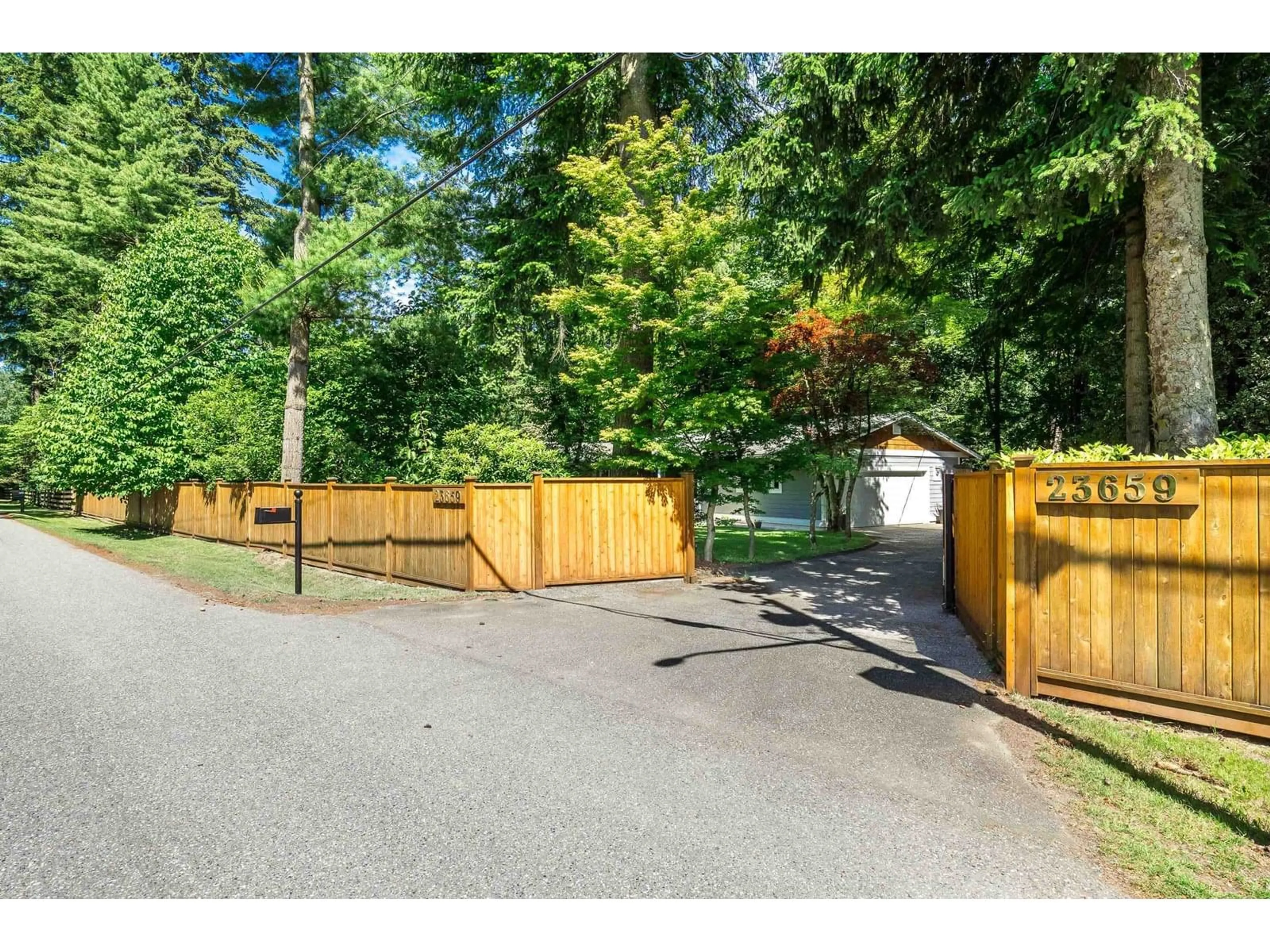 A pic from outside/outdoor area/front of a property/back of a property/a pic from drone, street for 23659 53A, Langley British Columbia V2Z2P4