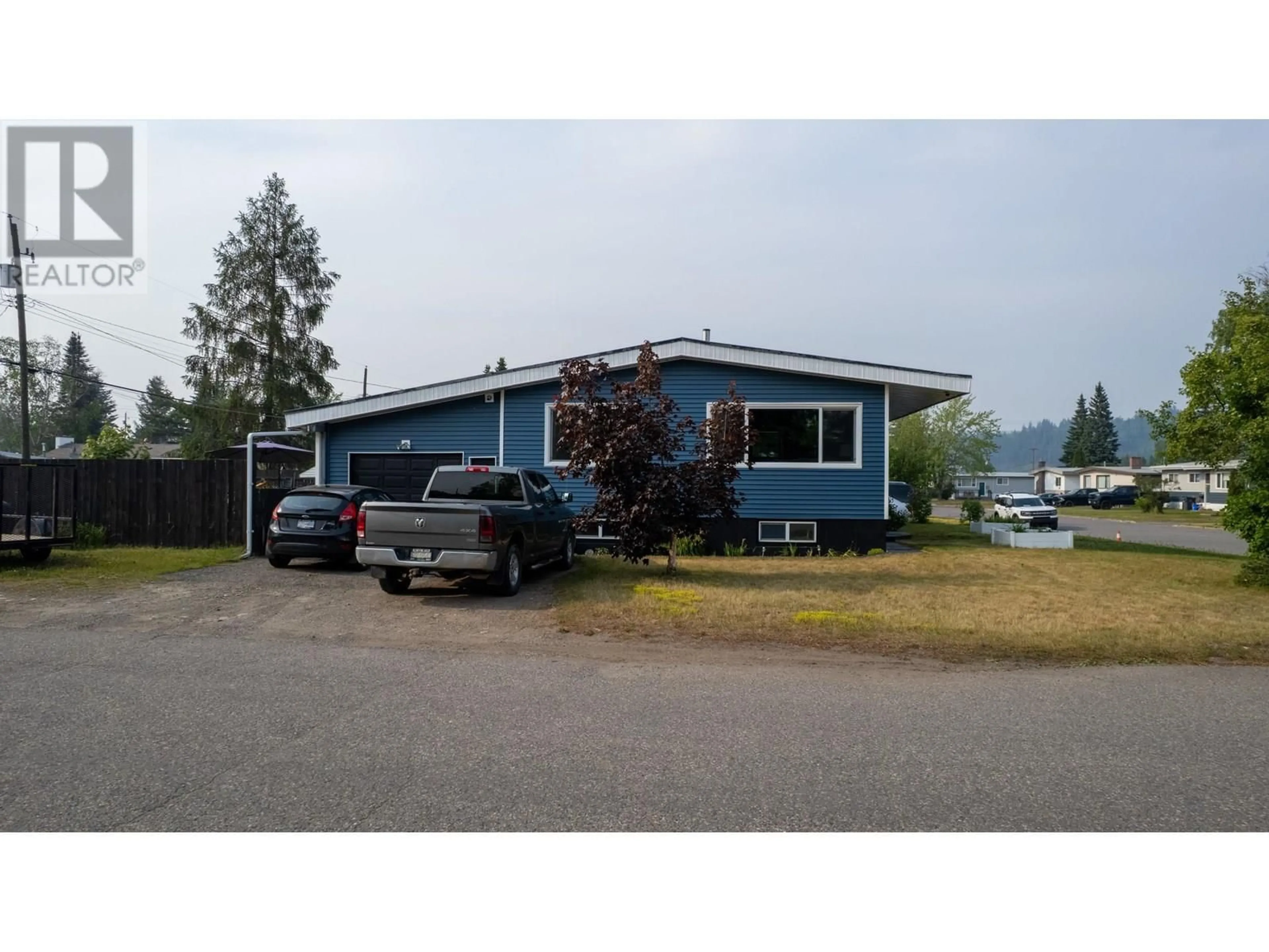 Home with vinyl exterior material, street for 285 KELLY STREET, Prince George British Columbia V2M3K2