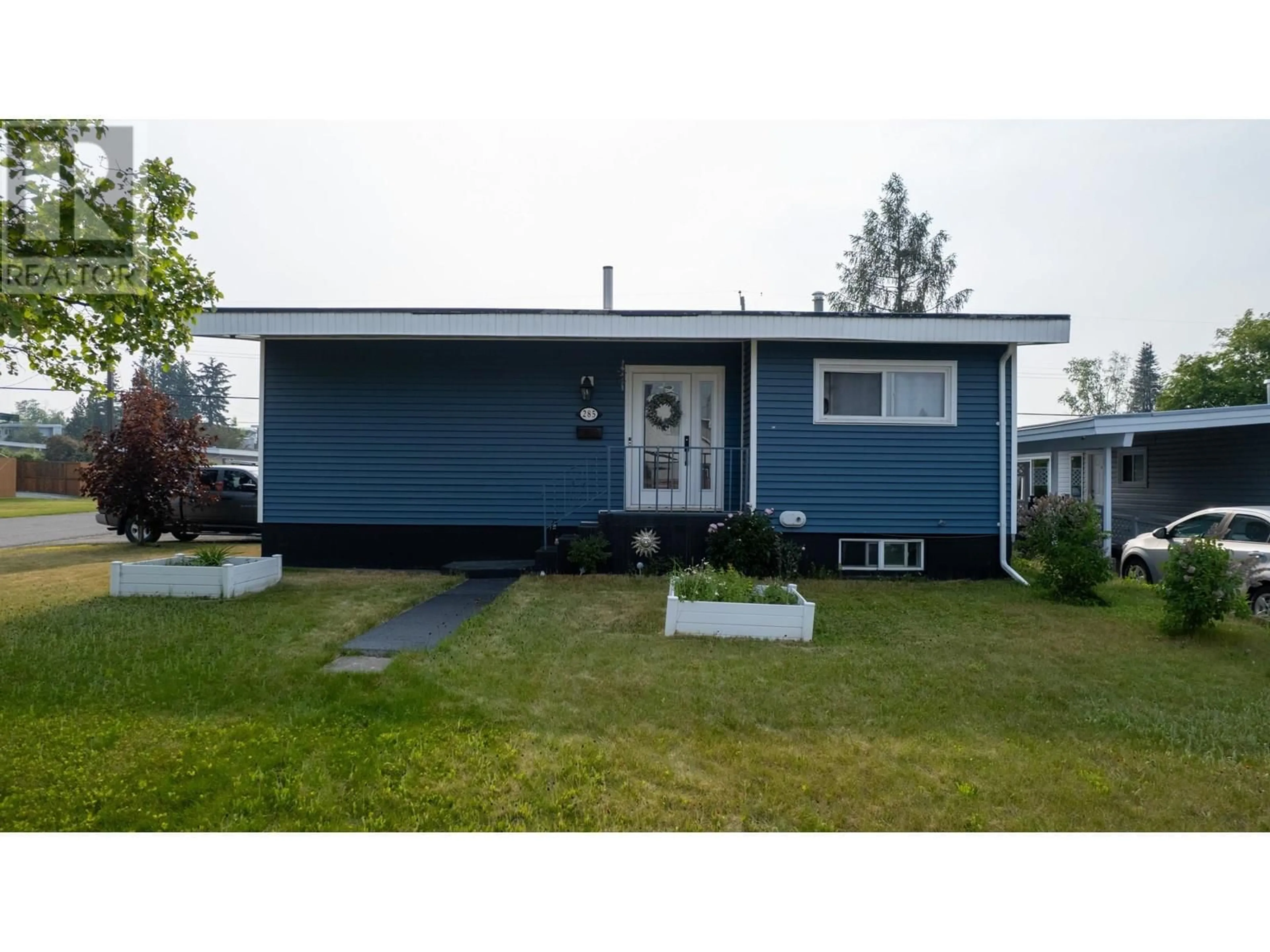 Home with vinyl exterior material, street for 285 KELLY STREET, Prince George British Columbia V2M3K2