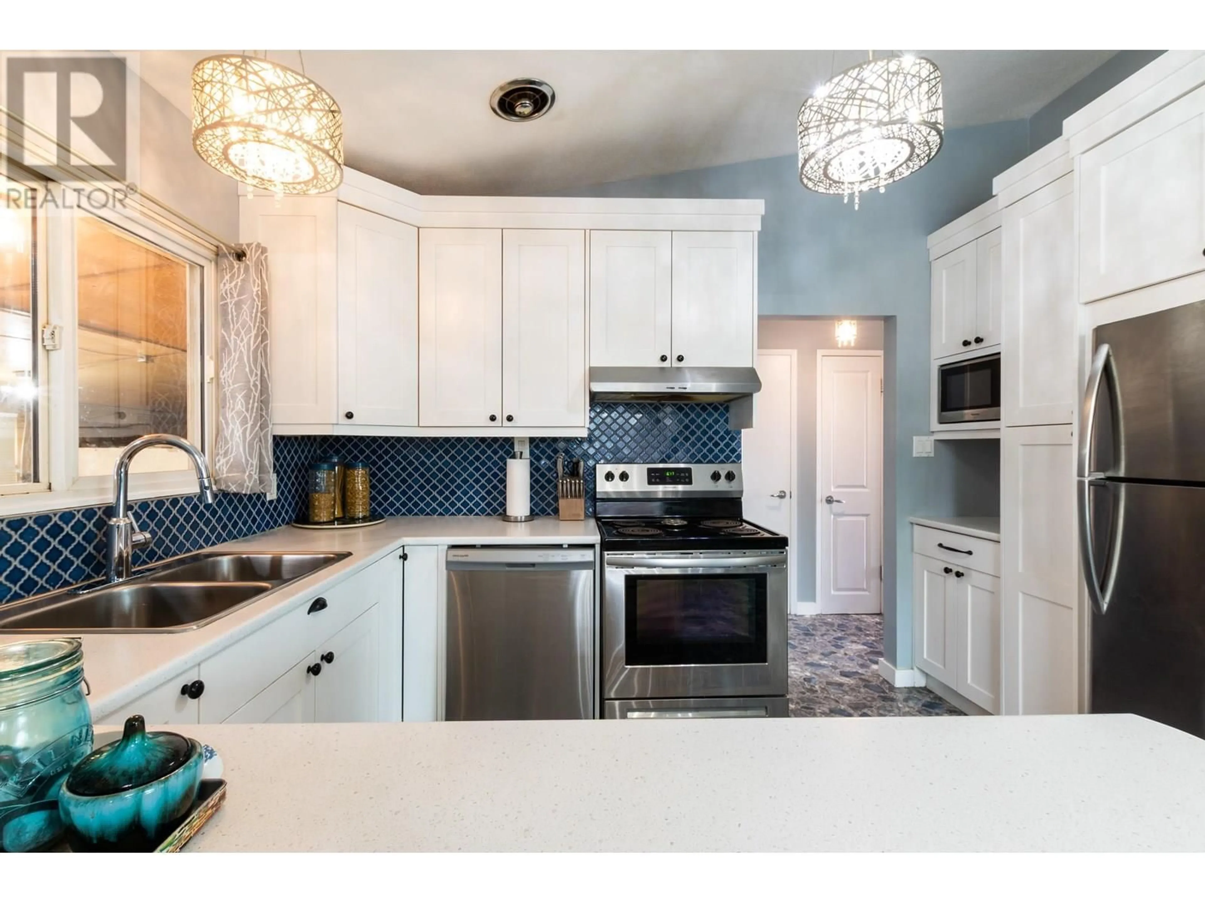 Open concept kitchen, ceramic/tile floor for 285 KELLY STREET, Prince George British Columbia V2M3K2