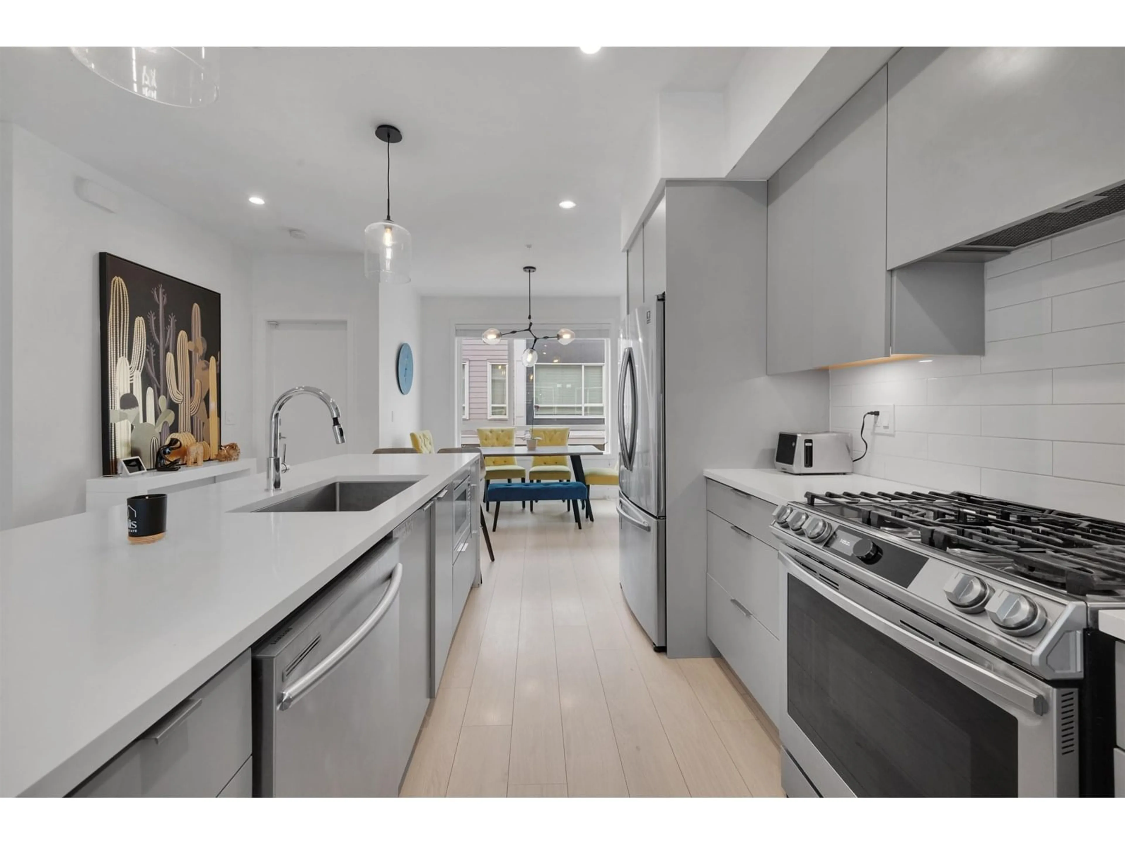 Open concept kitchen, ceramic/tile floor for 29 - 19628 55A, Langley British Columbia V3A3X2