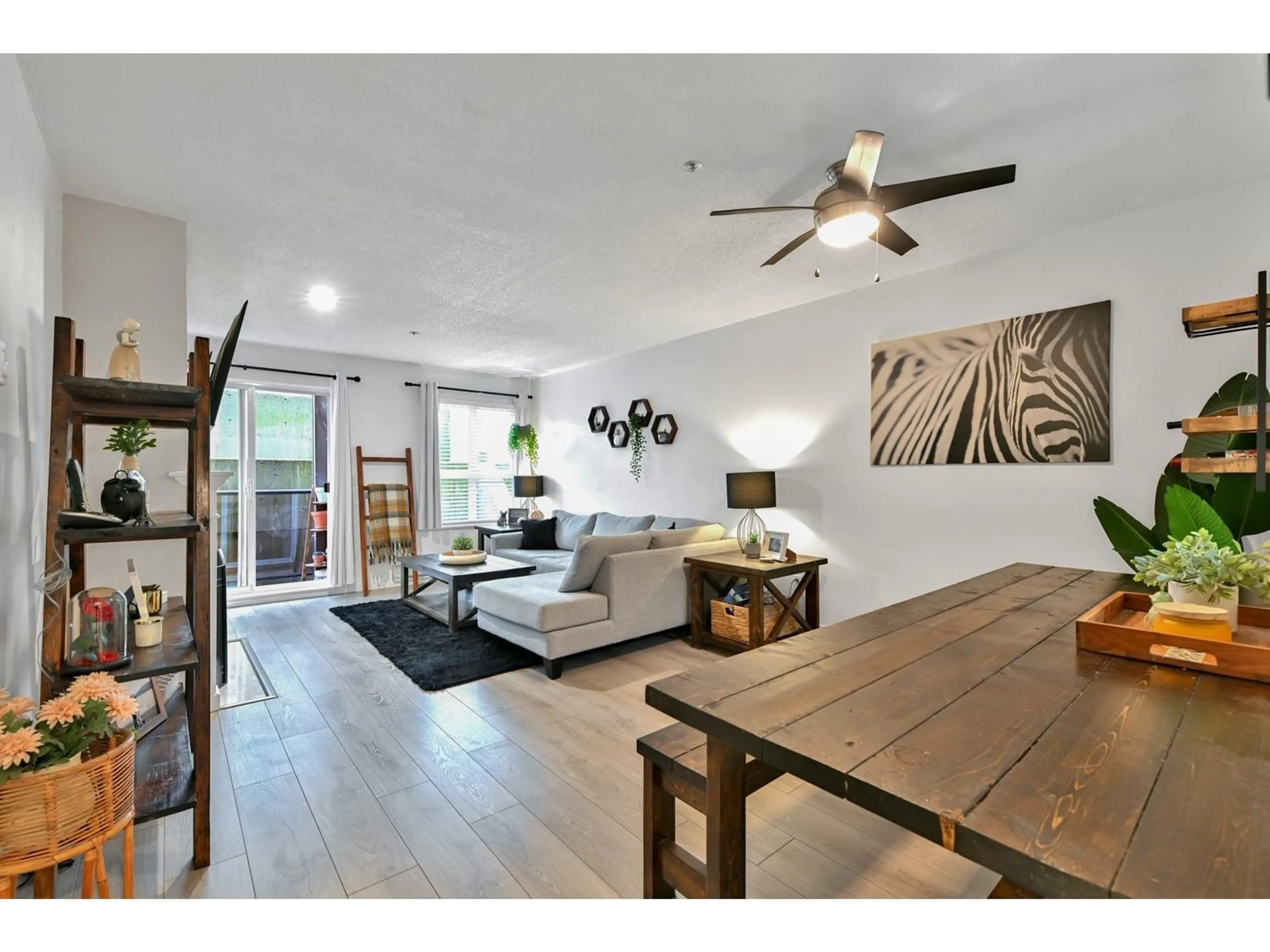 Living room with furniture, wood/laminate floor for 203 - 33165 2, Mission British Columbia V2V6T8