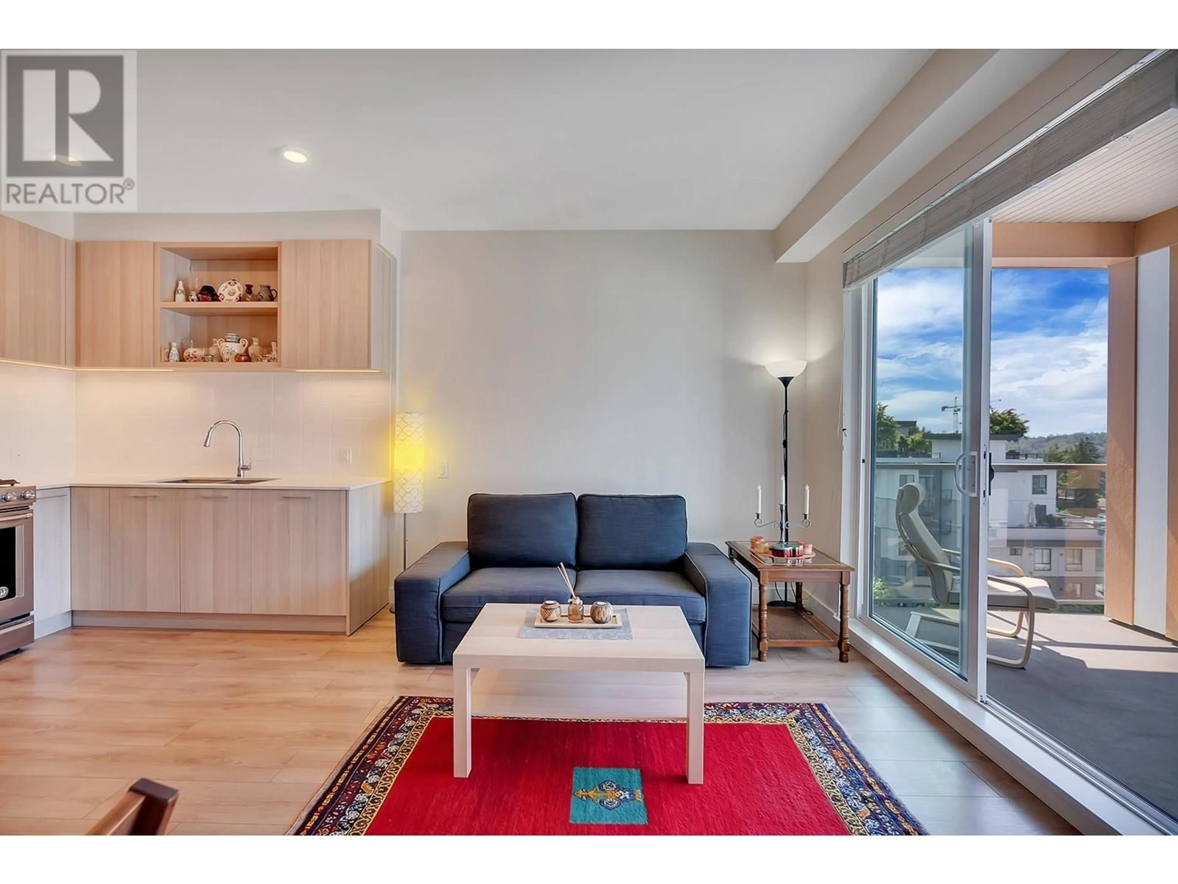 Living room with furniture, wood/laminate floor for 620 - 721 ANSKAR COURT, Coquitlam British Columbia V3J0L4