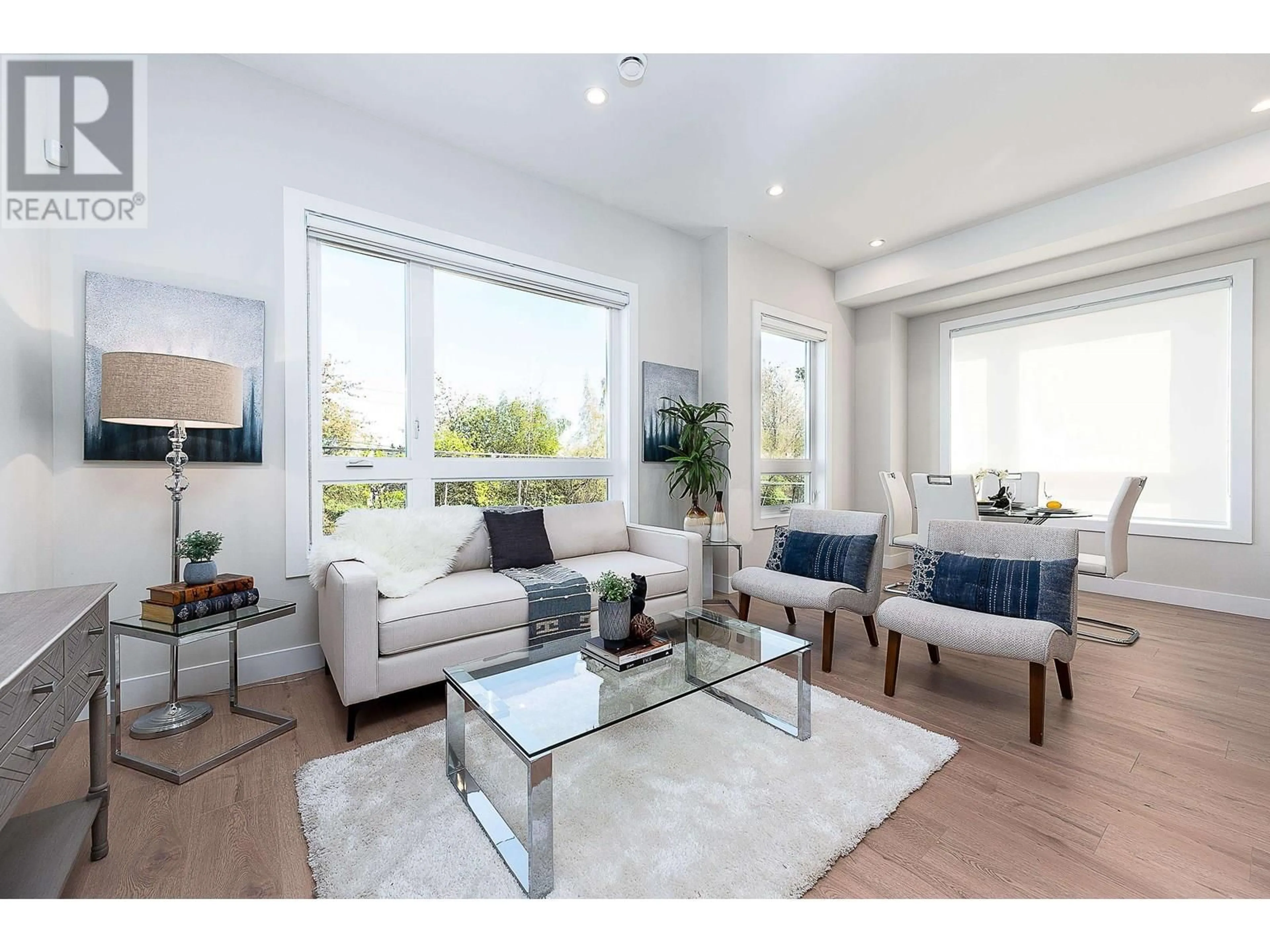 Living room with furniture, wood/laminate floor for 9 - 3033 SHELL ROAD, Richmond British Columbia V6X0B8