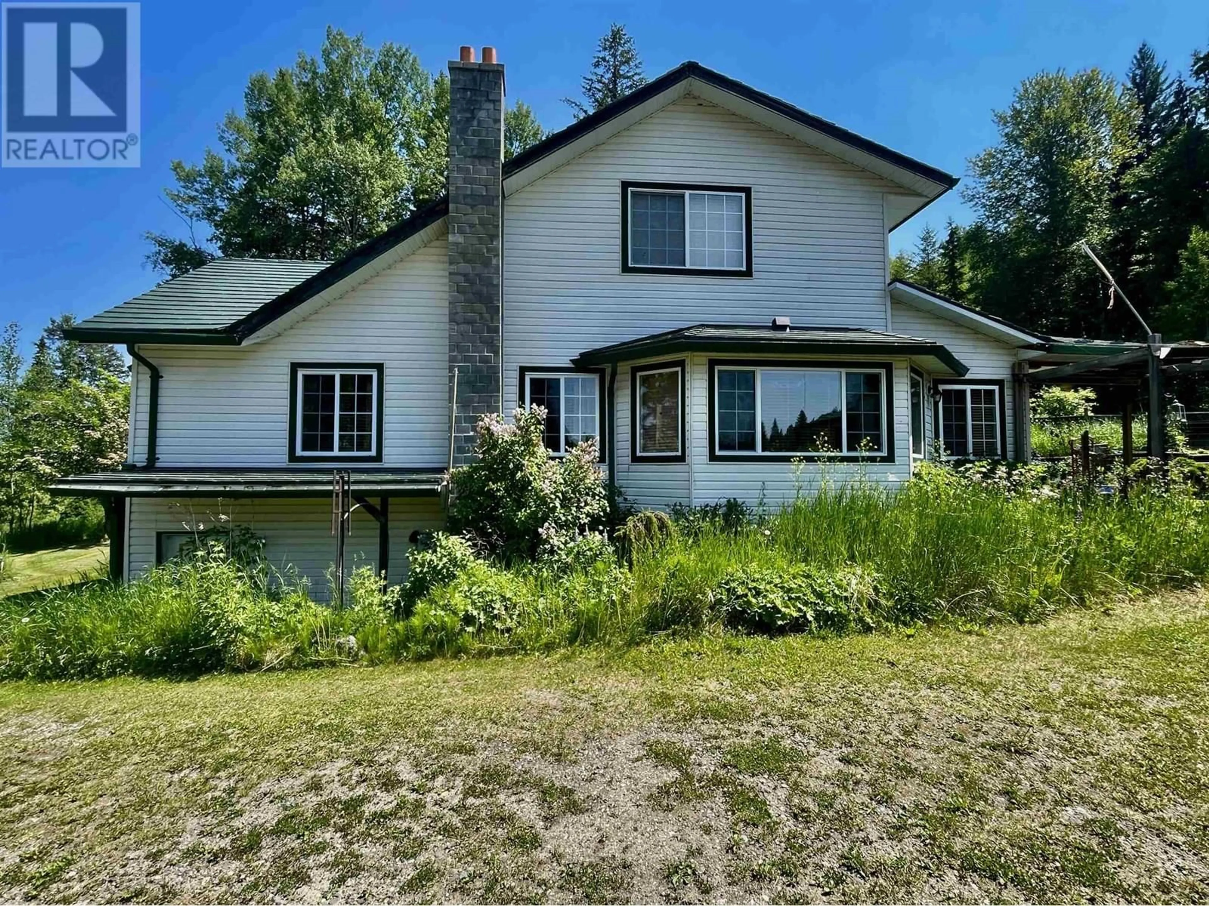 A pic from outside/outdoor area/front of a property/back of a property/a pic from drone, water/lake/river/ocean view for 7310 CANIM LAKE ROAD, 100 Mile House British Columbia V0K1J0