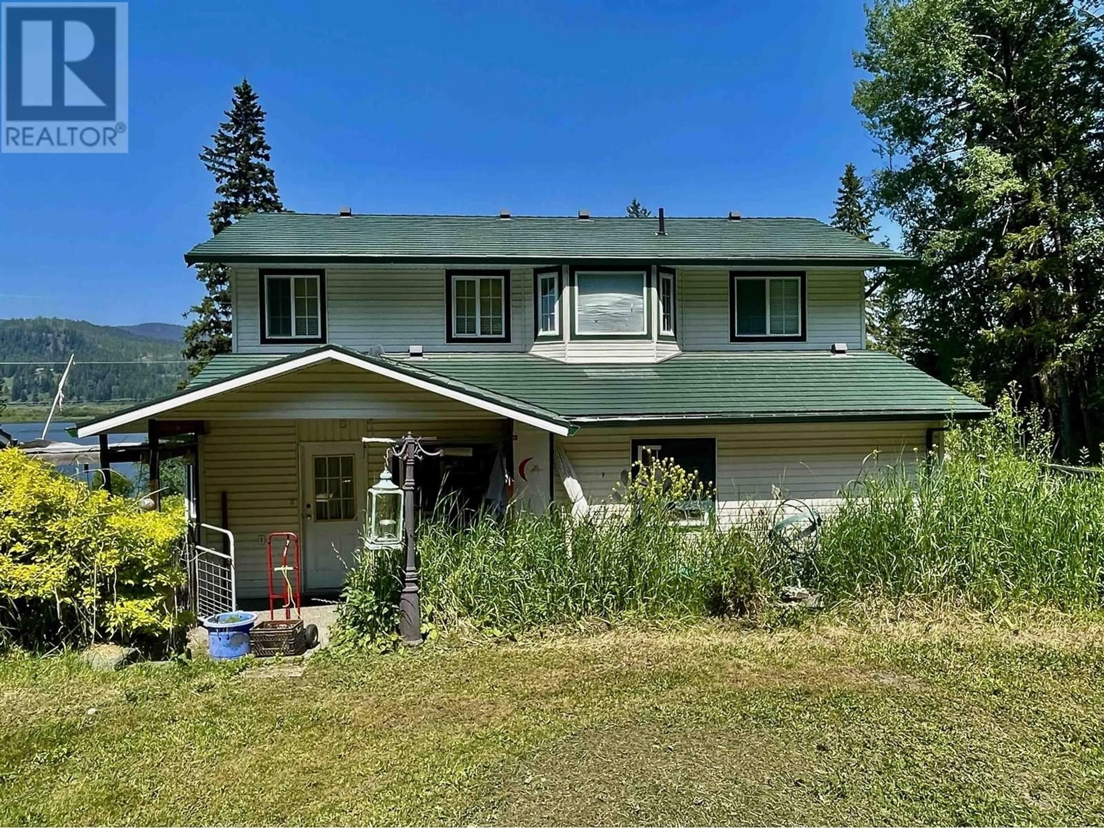 A pic from outside/outdoor area/front of a property/back of a property/a pic from drone, unknown for 7310 CANIM LAKE ROAD, 100 Mile House British Columbia V0K1J0