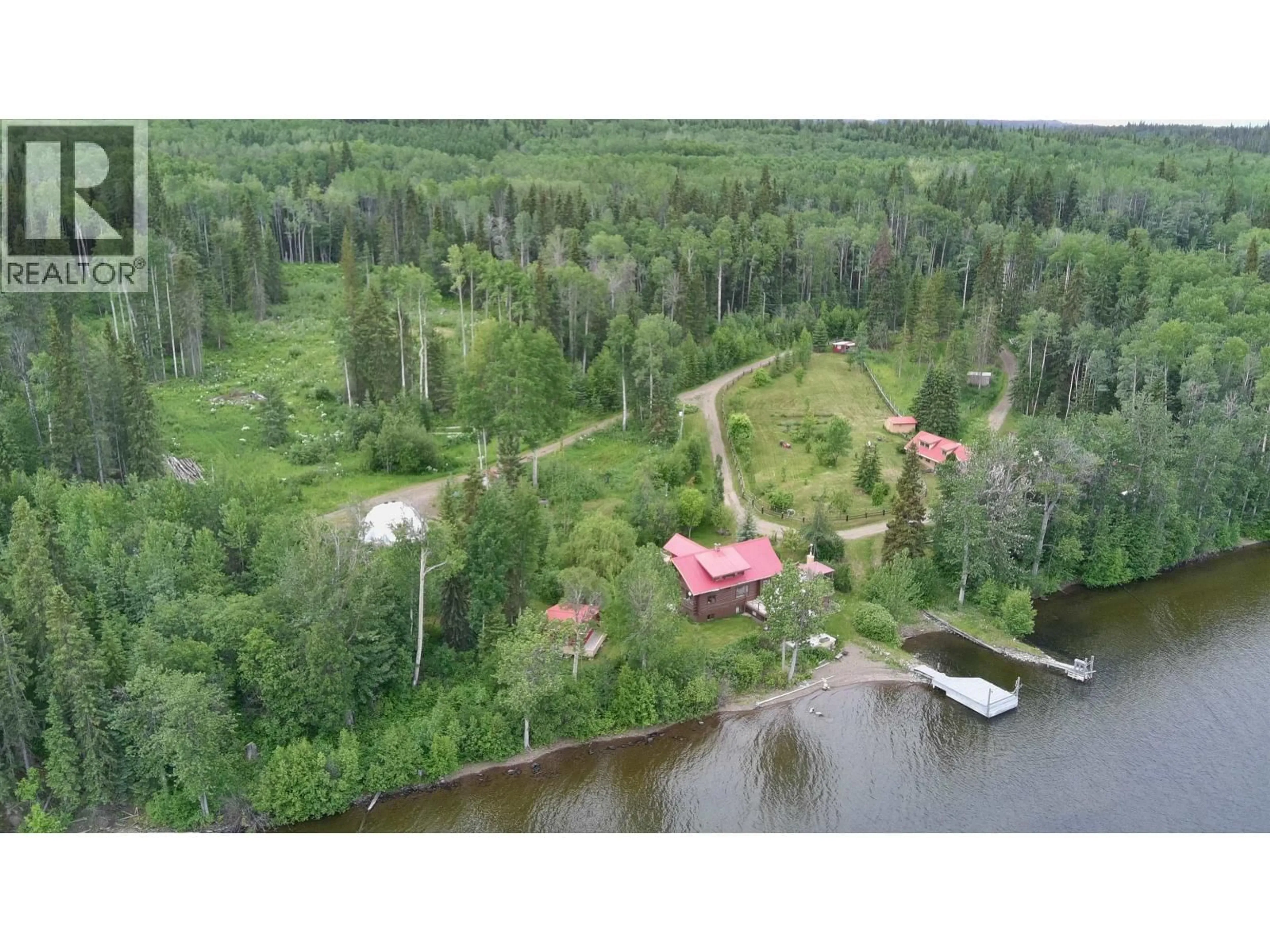 A pic from outside/outdoor area/front of a property/back of a property/a pic from drone, water/lake/river/ocean view for 23854 MUND ROAD, Burns Lake British Columbia V0J1E4