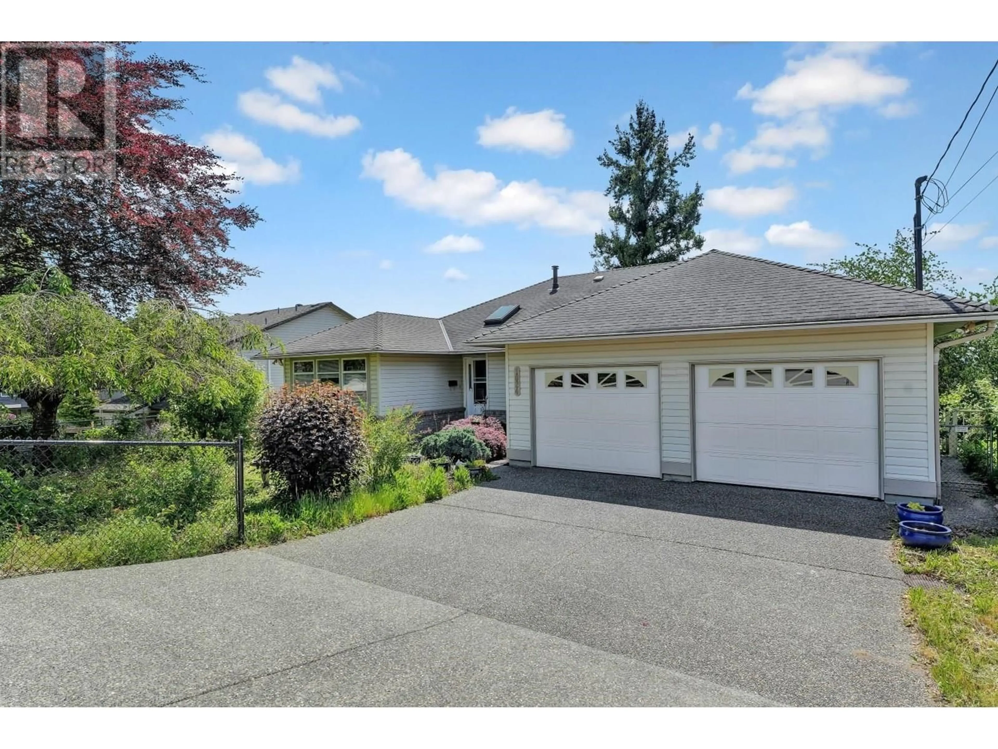 Home with vinyl exterior material, street for 1024 DELESTRE AVENUE, Coquitlam British Columbia V3K2G8