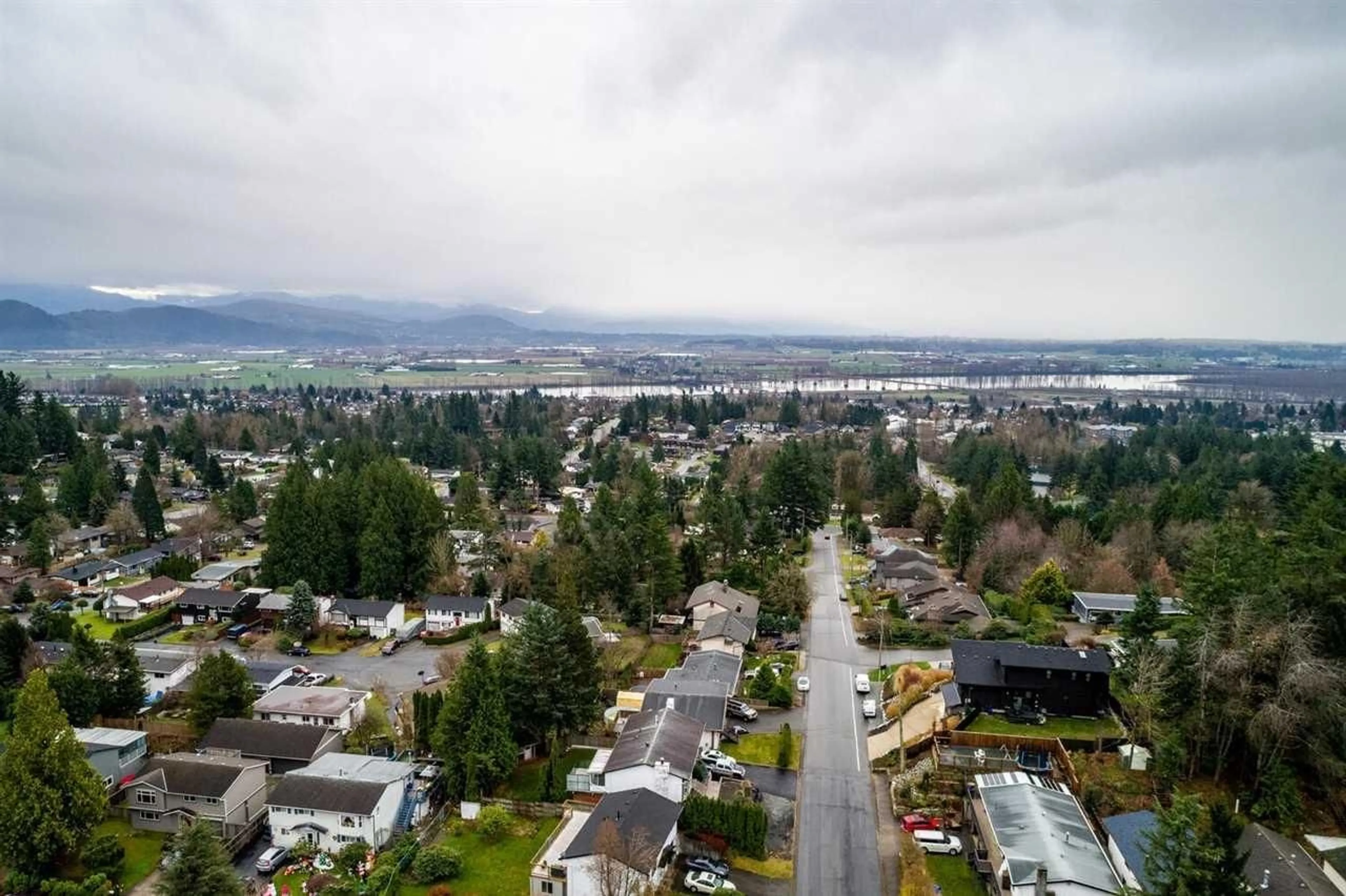 A pic from outside/outdoor area/front of a property/back of a property/a pic from drone, water/lake/river/ocean view for 8183 PHILBERT, Mission British Columbia V2V5N1
