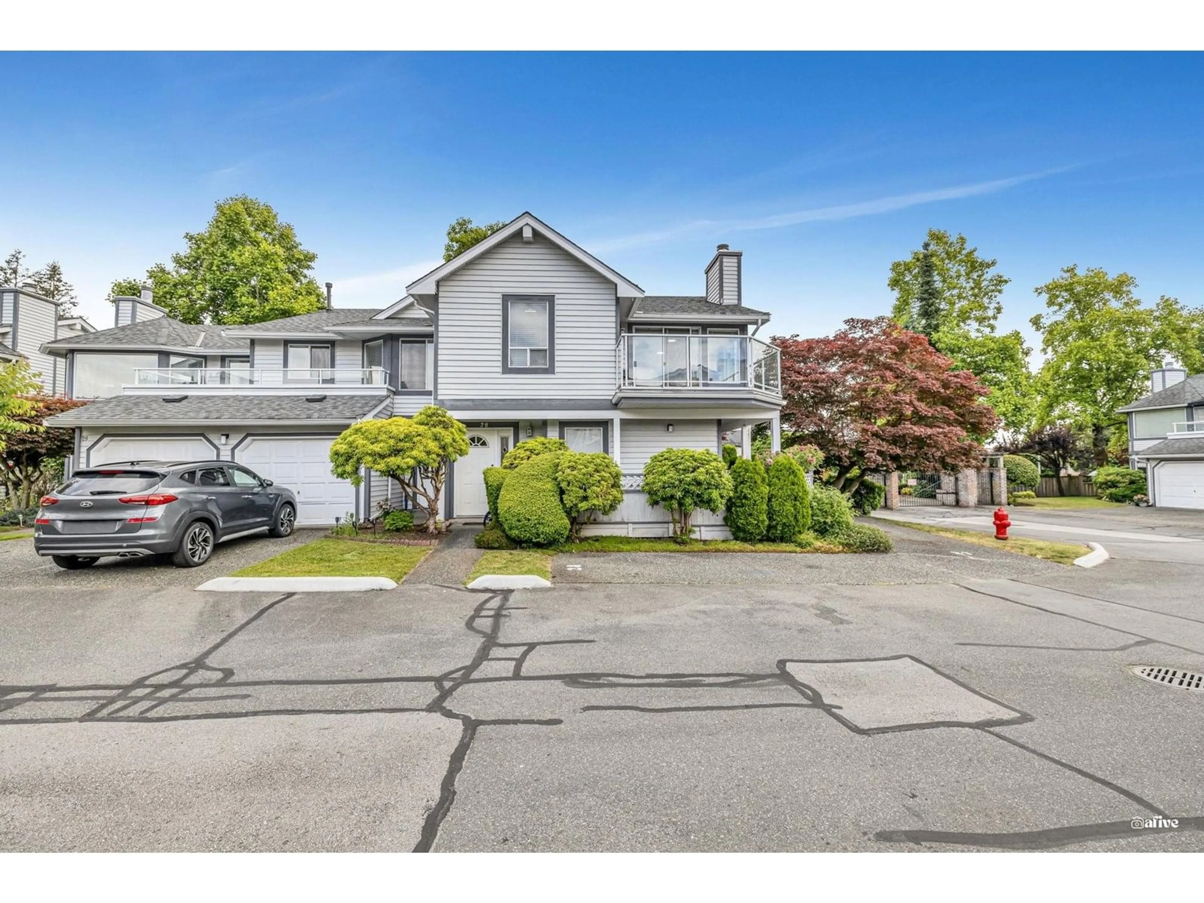 A pic from outside/outdoor area/front of a property/back of a property/a pic from drone, street for 28 - 9261 122, Surrey British Columbia V3V7R4