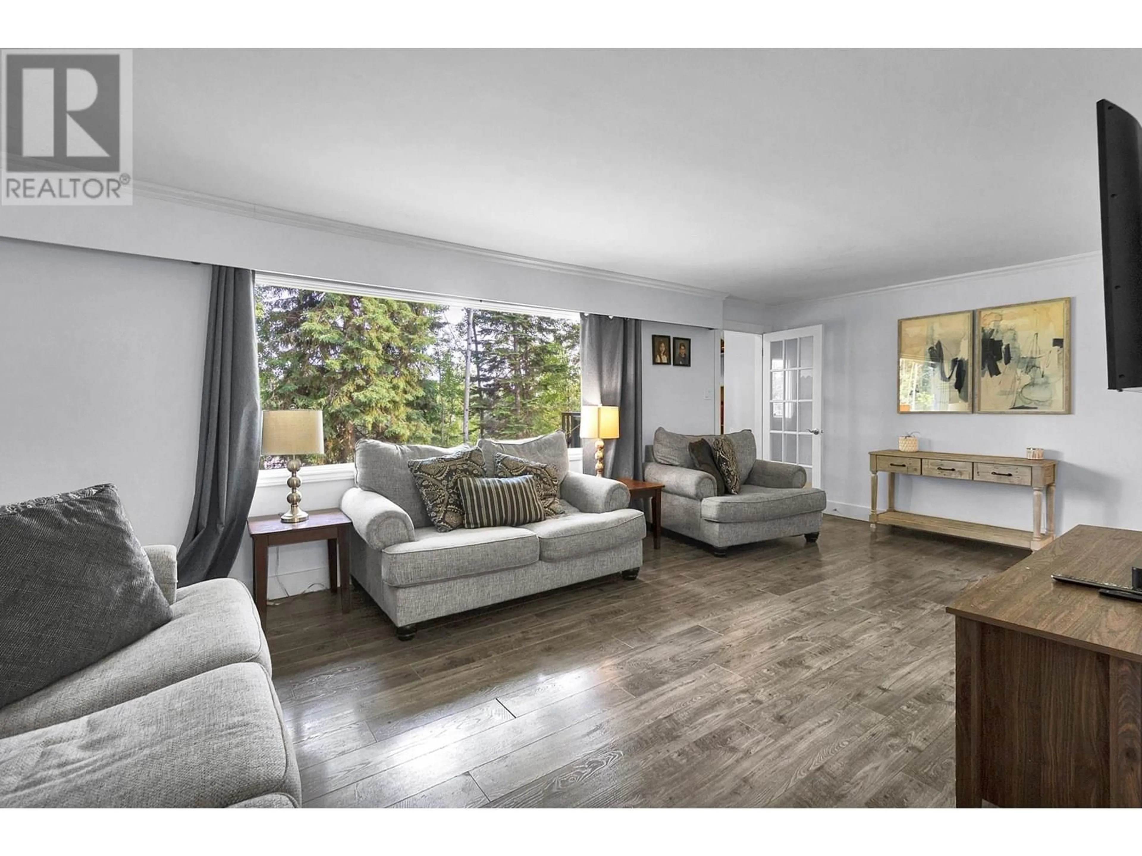 Living room with furniture, wood/laminate floor for 2041 SOMMERVILLE ROAD, Prince George British Columbia V2N6T6