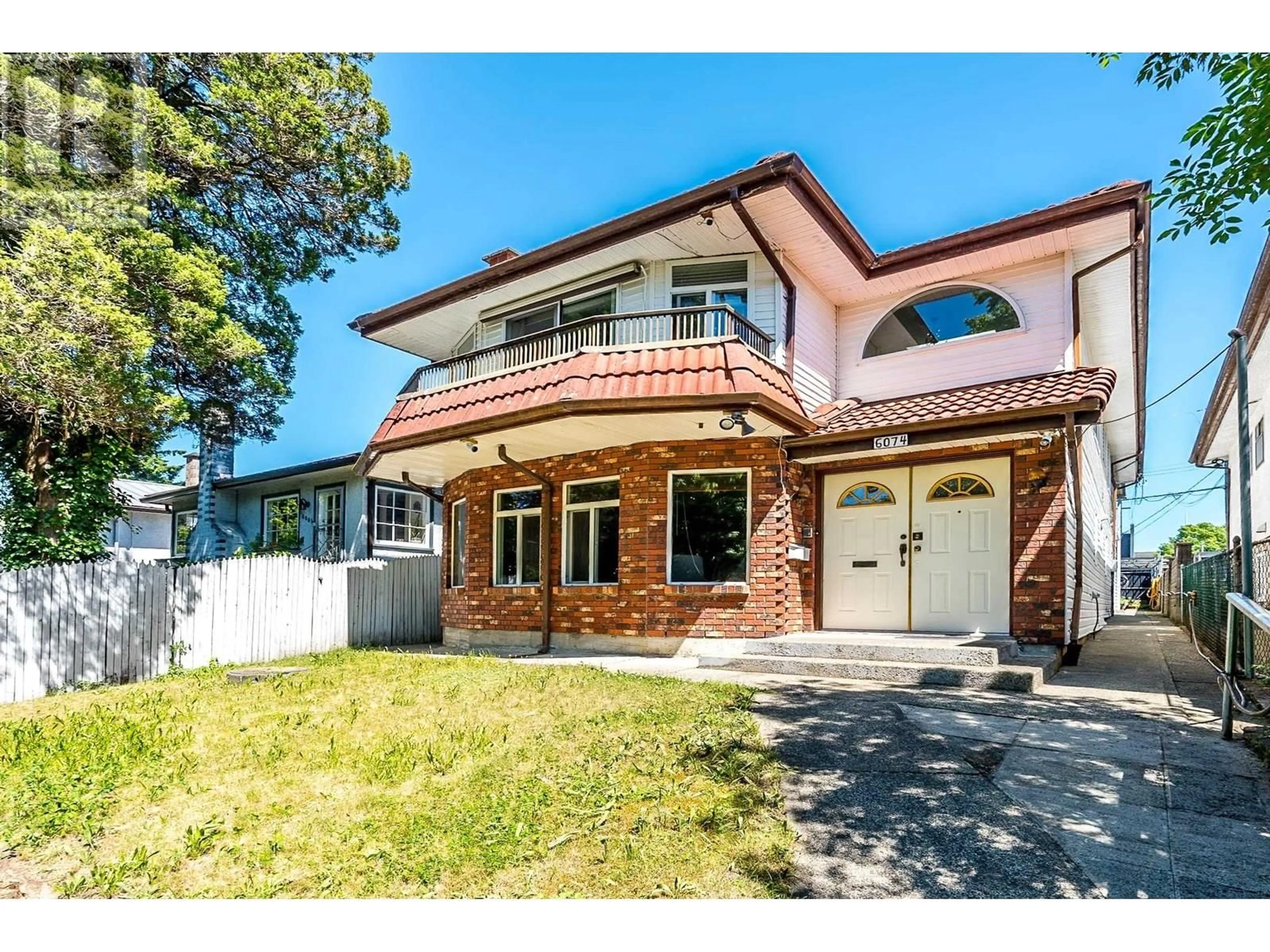 Home with brick exterior material, street for 6074 SHERBROOKE STREET, Vancouver British Columbia V5W3N2