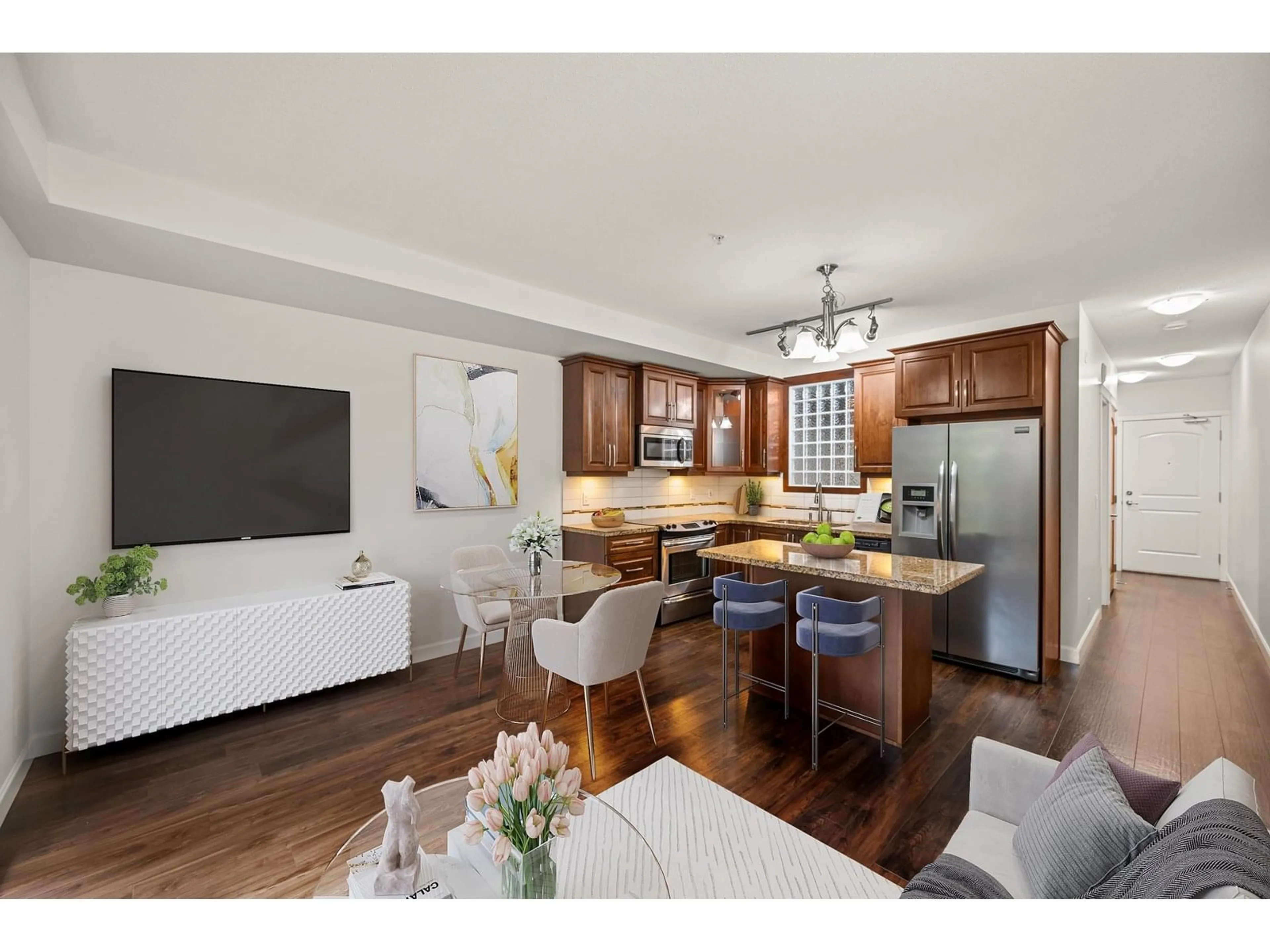 Open concept kitchen, wood/laminate floor for 310 - 8328 207A, Langley British Columbia V2Y0K5