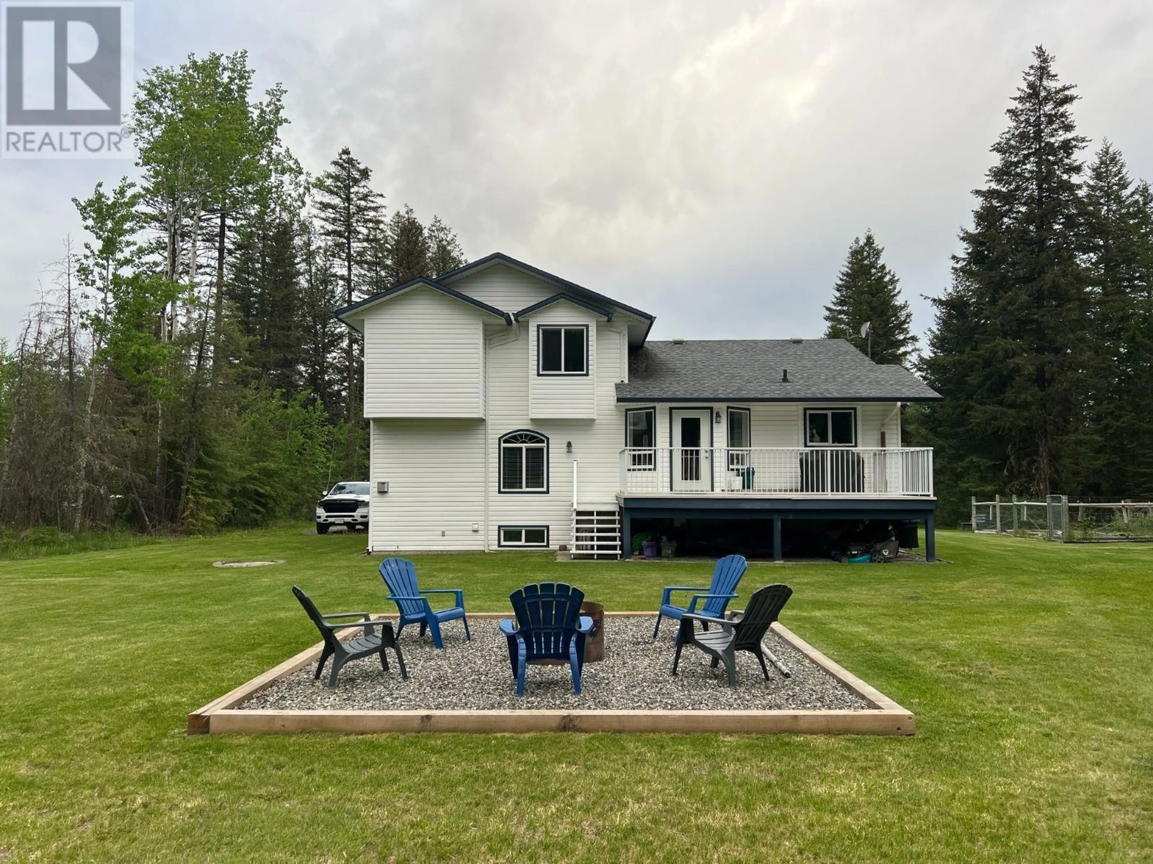 A pic from outside/outdoor area/front of a property/back of a property/a pic from drone, water/lake/river/ocean view for 140 BORLAND DRIVE, 150 Mile House British Columbia V0K2G0