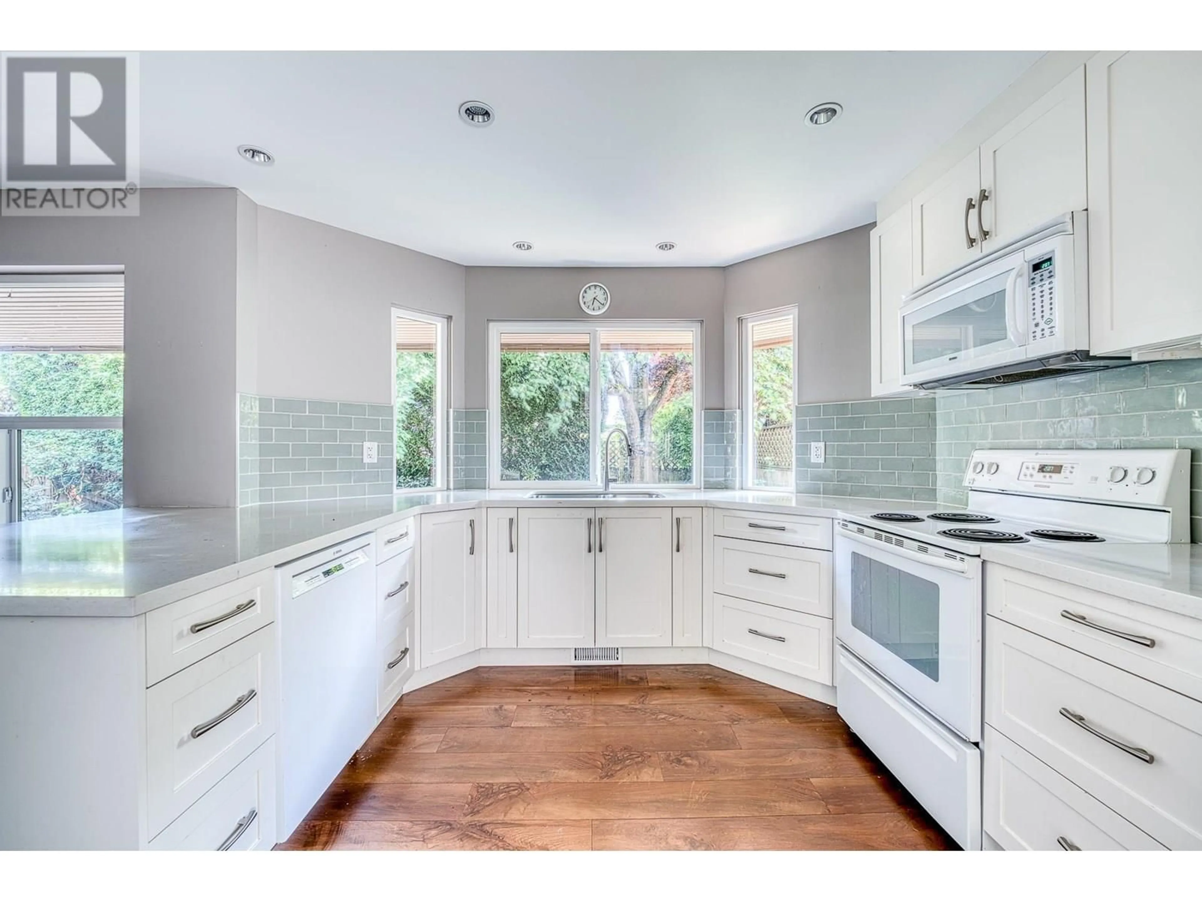 Open concept kitchen, ceramic/tile floor for 10680 BISSETT DRIVE, Richmond British Columbia V7A4L3