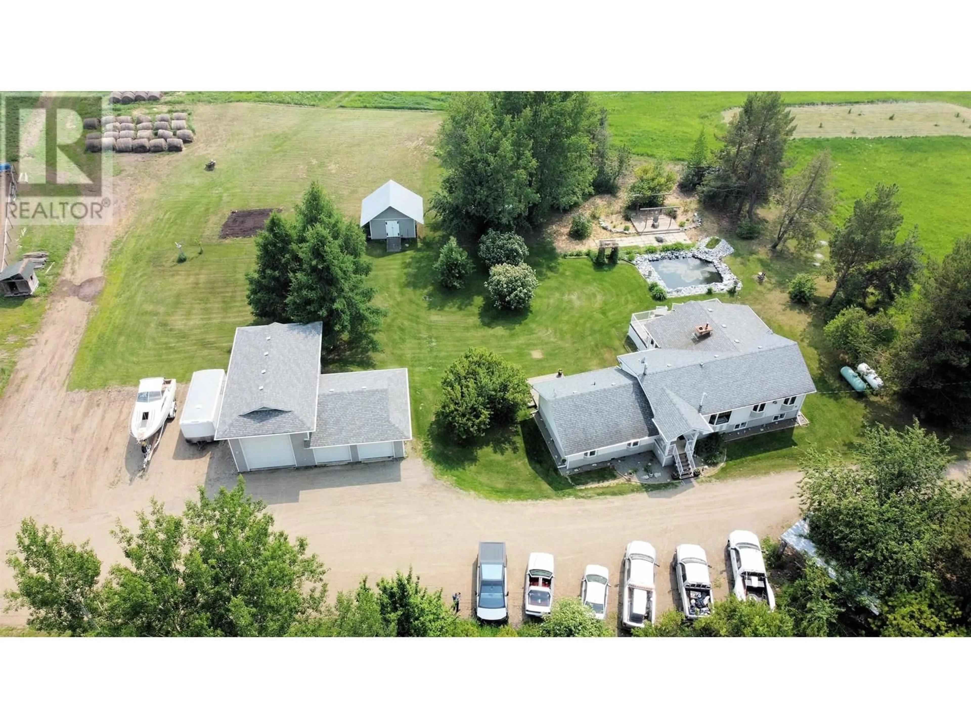 A pic from outside/outdoor area/front of a property/back of a property/a pic from drone, unknown for 14940 ROBINSON ROAD, Prince George British Columbia V2K5K9