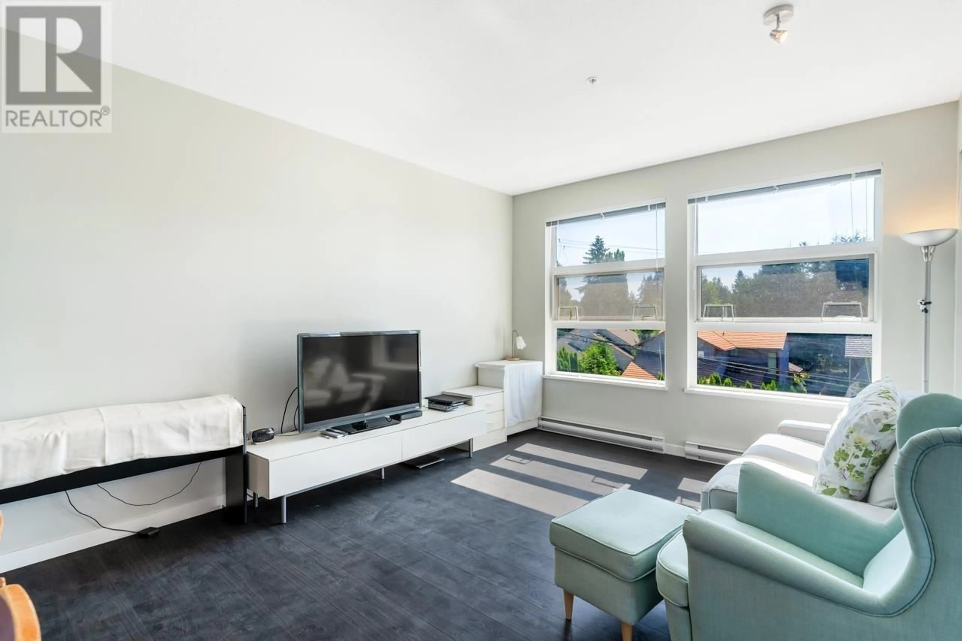 Living room with furniture, unknown for 301 - 609 COTTONWOOD AVENUE, Coquitlam British Columbia V3J0H2