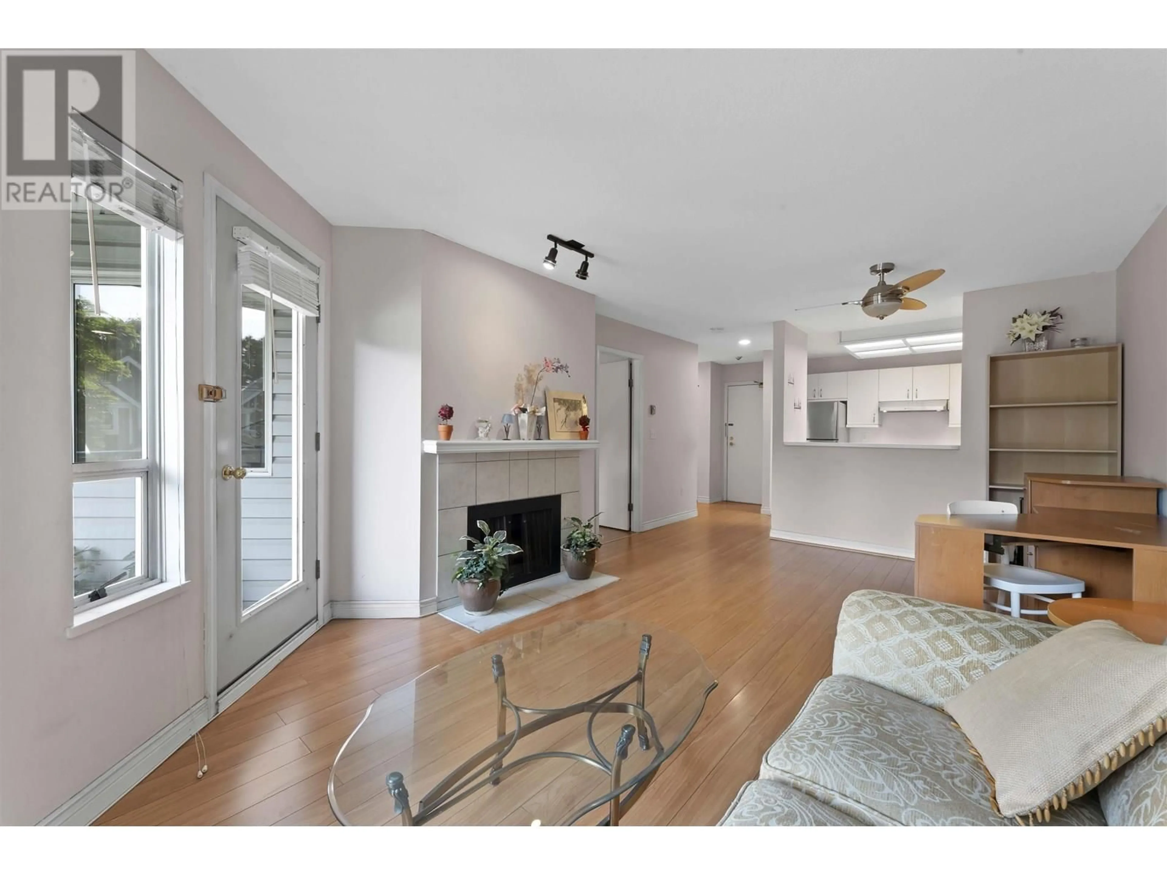Living room with furniture, wood/laminate floor for 112 - 7840 MOFFATT ROAD, Richmond British Columbia V6Y1X8