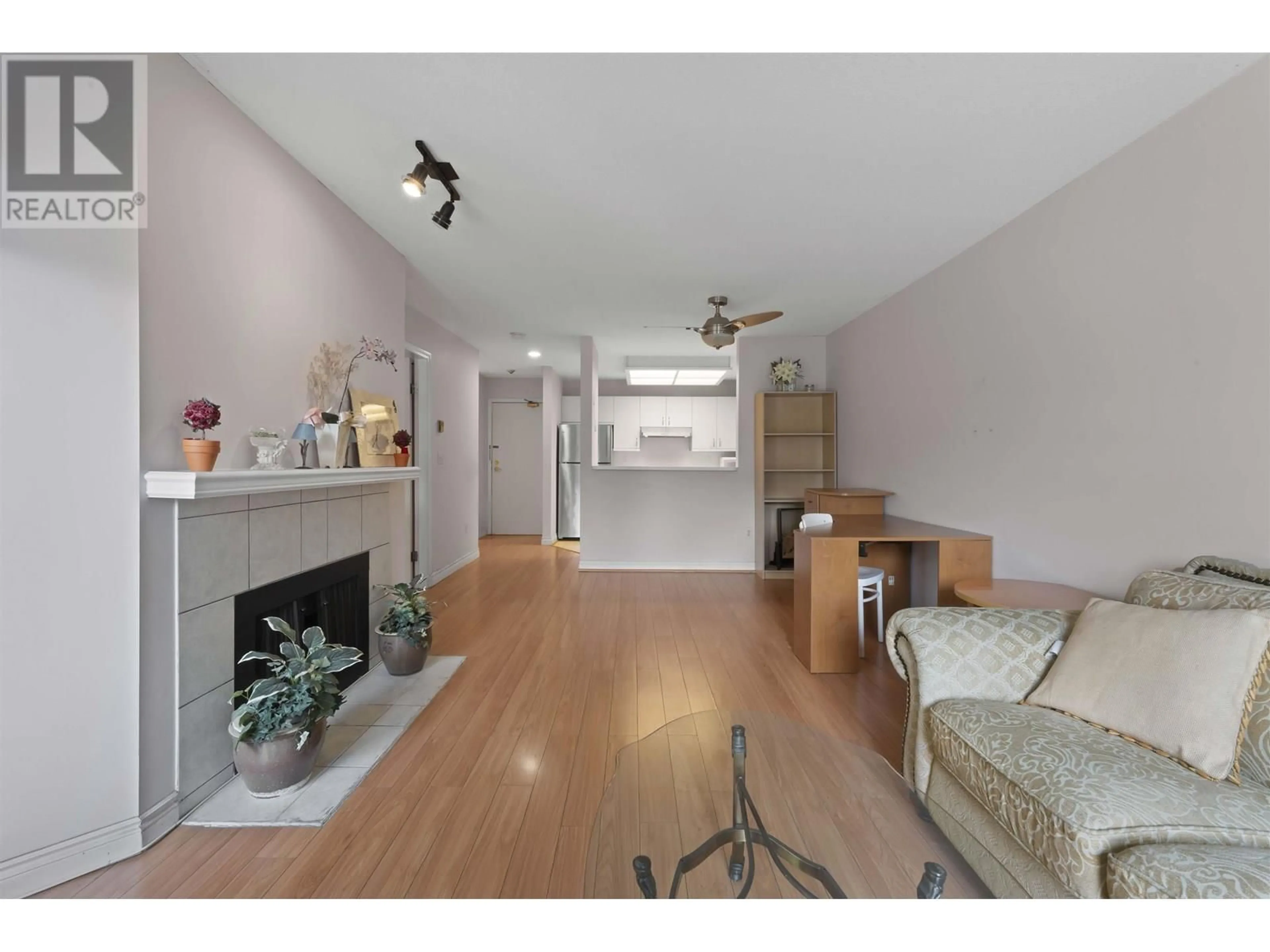 Living room with furniture, wood/laminate floor for 112 - 7840 MOFFATT ROAD, Richmond British Columbia V6Y1X8