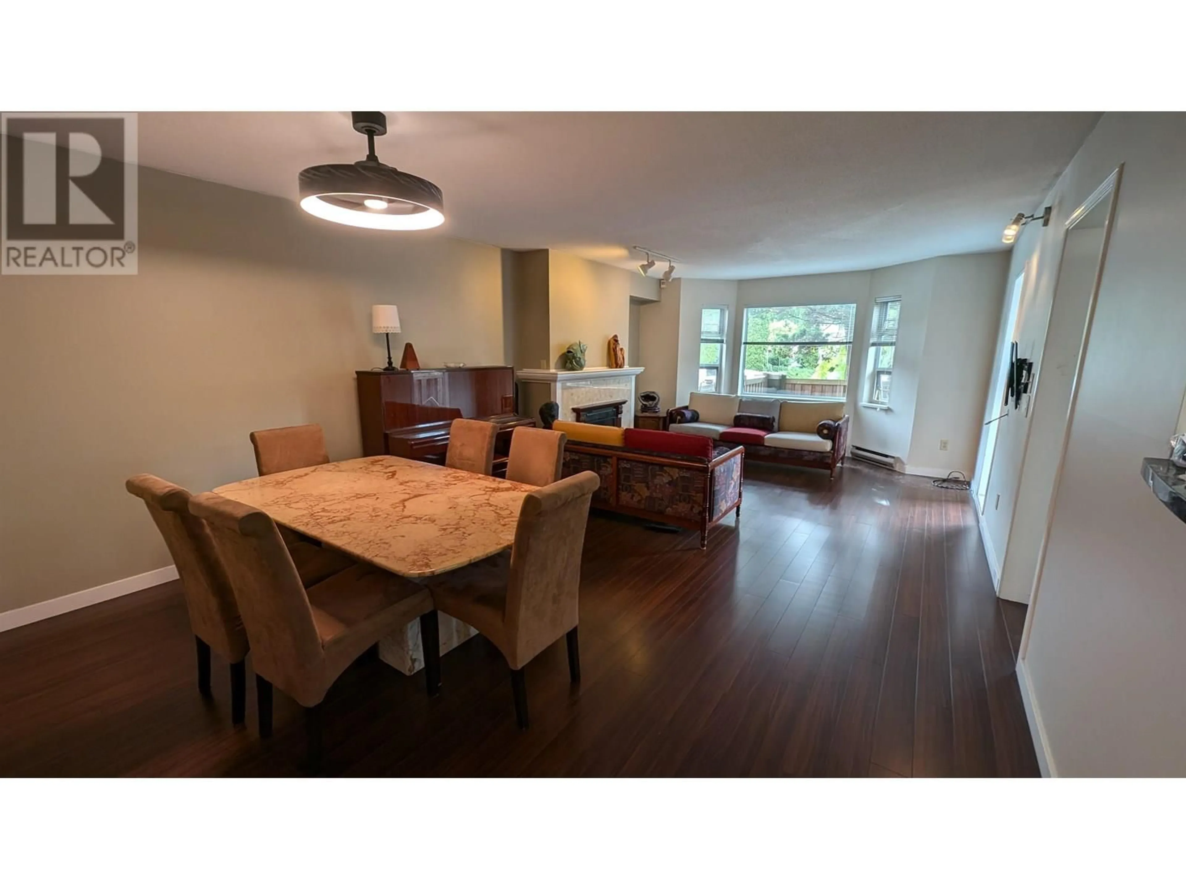 Dining room, wood/laminate floor for 103 - 5700 ARCADIA ROAD, Richmond British Columbia V6X2G9