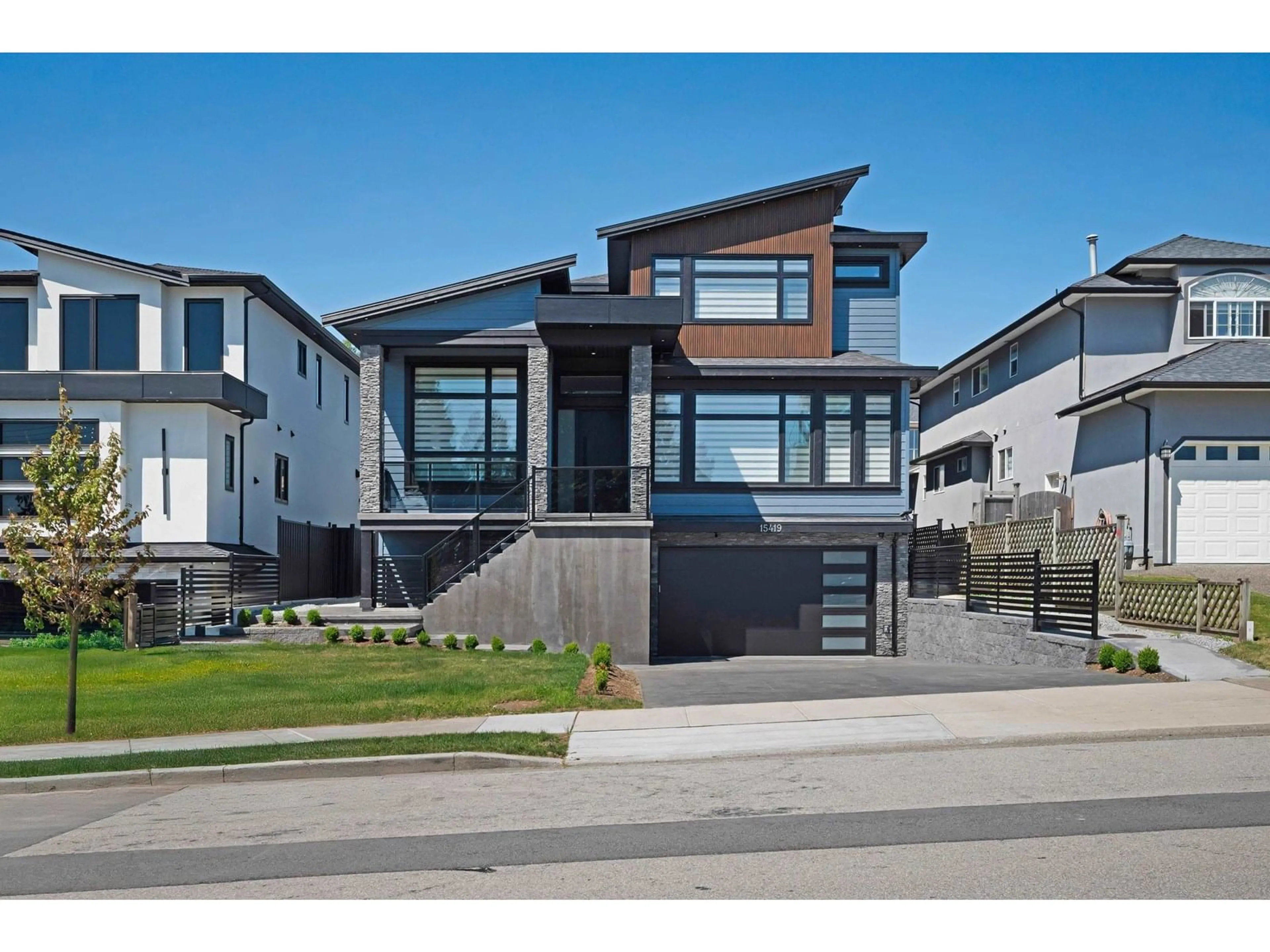 Home with vinyl exterior material, street for 15419 82, Surrey British Columbia V3S2K8