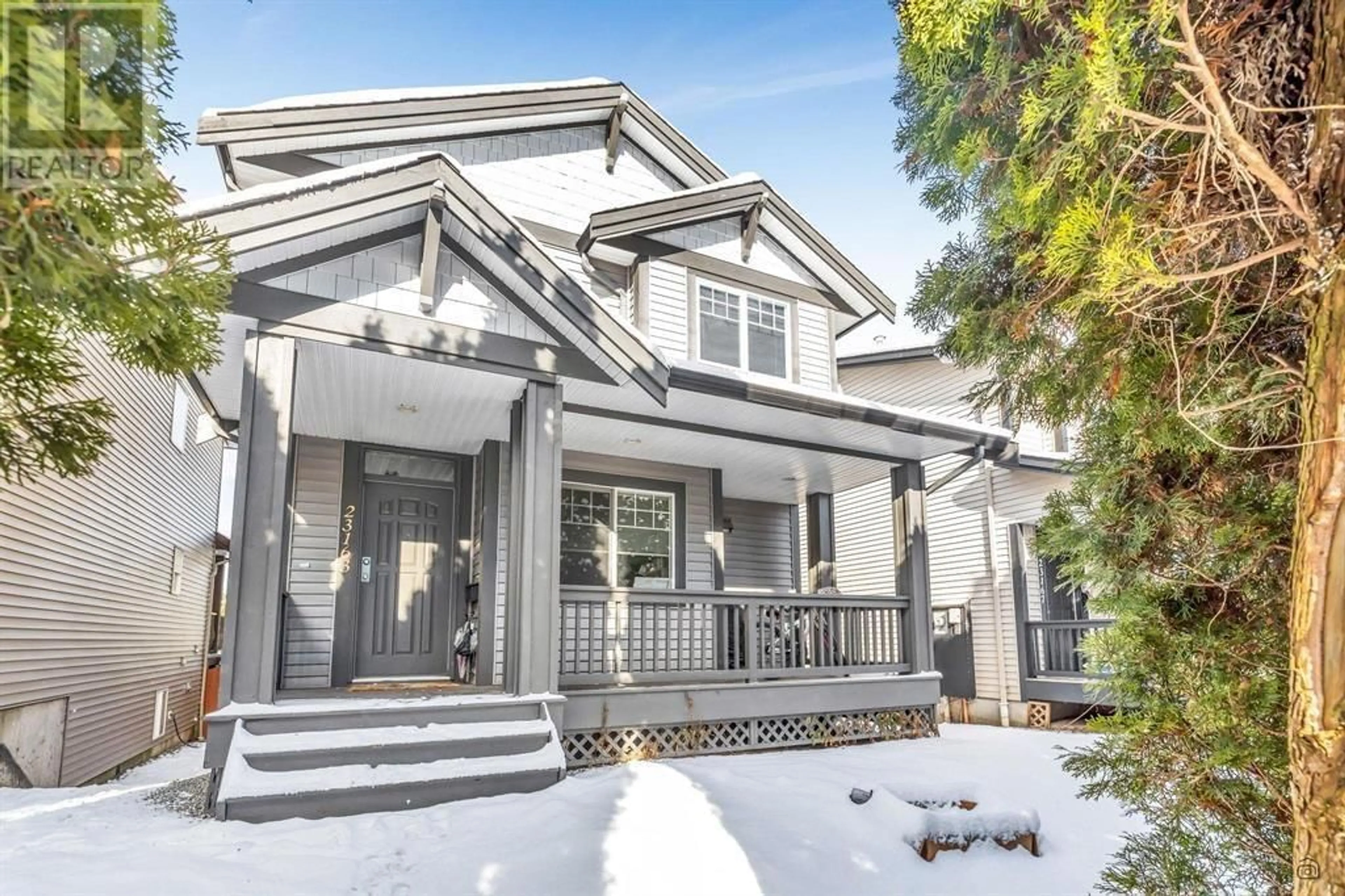 Home with vinyl exterior material, street for 23163 DEWDNEY TRUNK ROAD, Maple Ridge British Columbia V2X8L3
