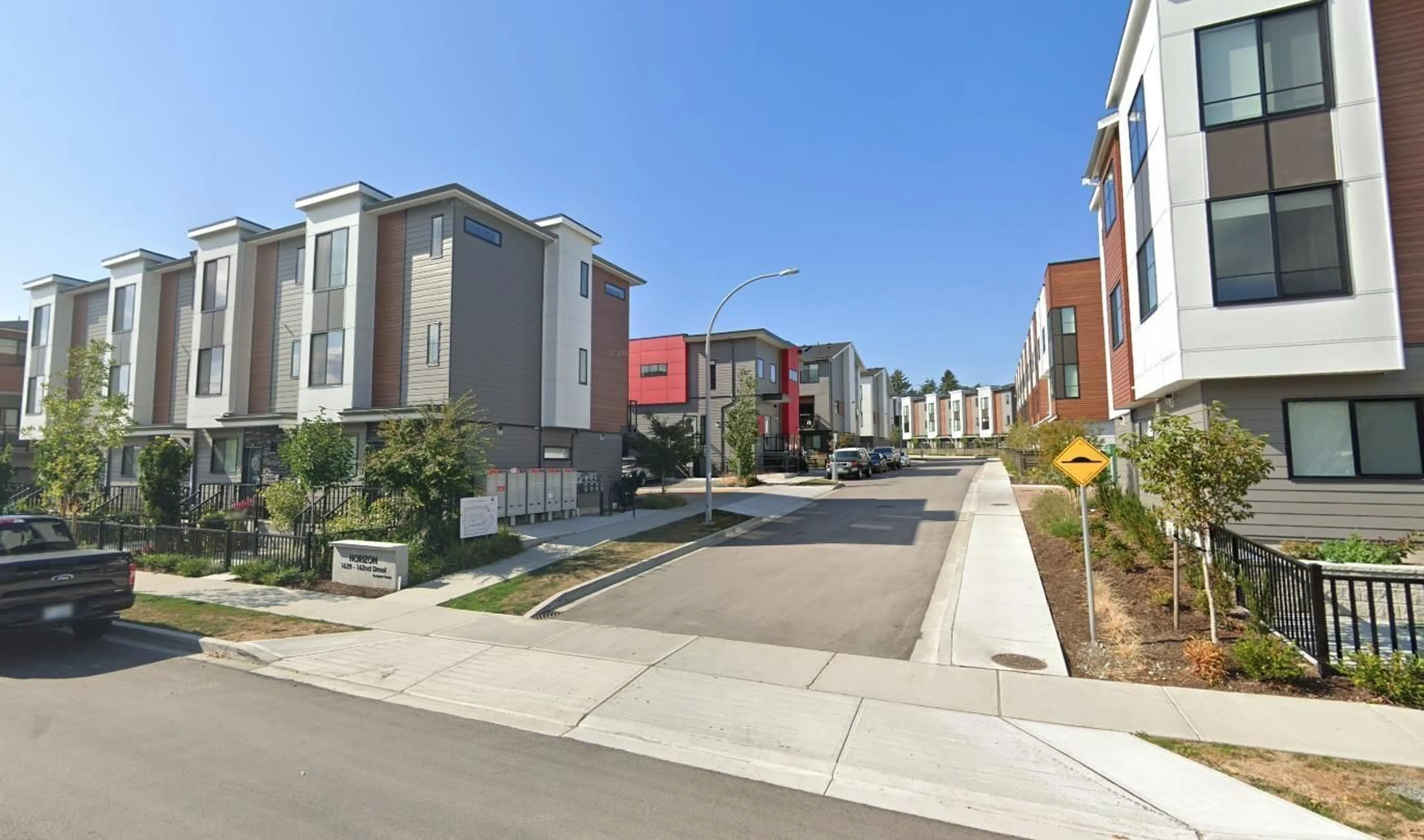 A pic from outside/outdoor area/front of a property/back of a property/a pic from drone, street for 10 - 1639 162, Surrey British Columbia V4A4Y1