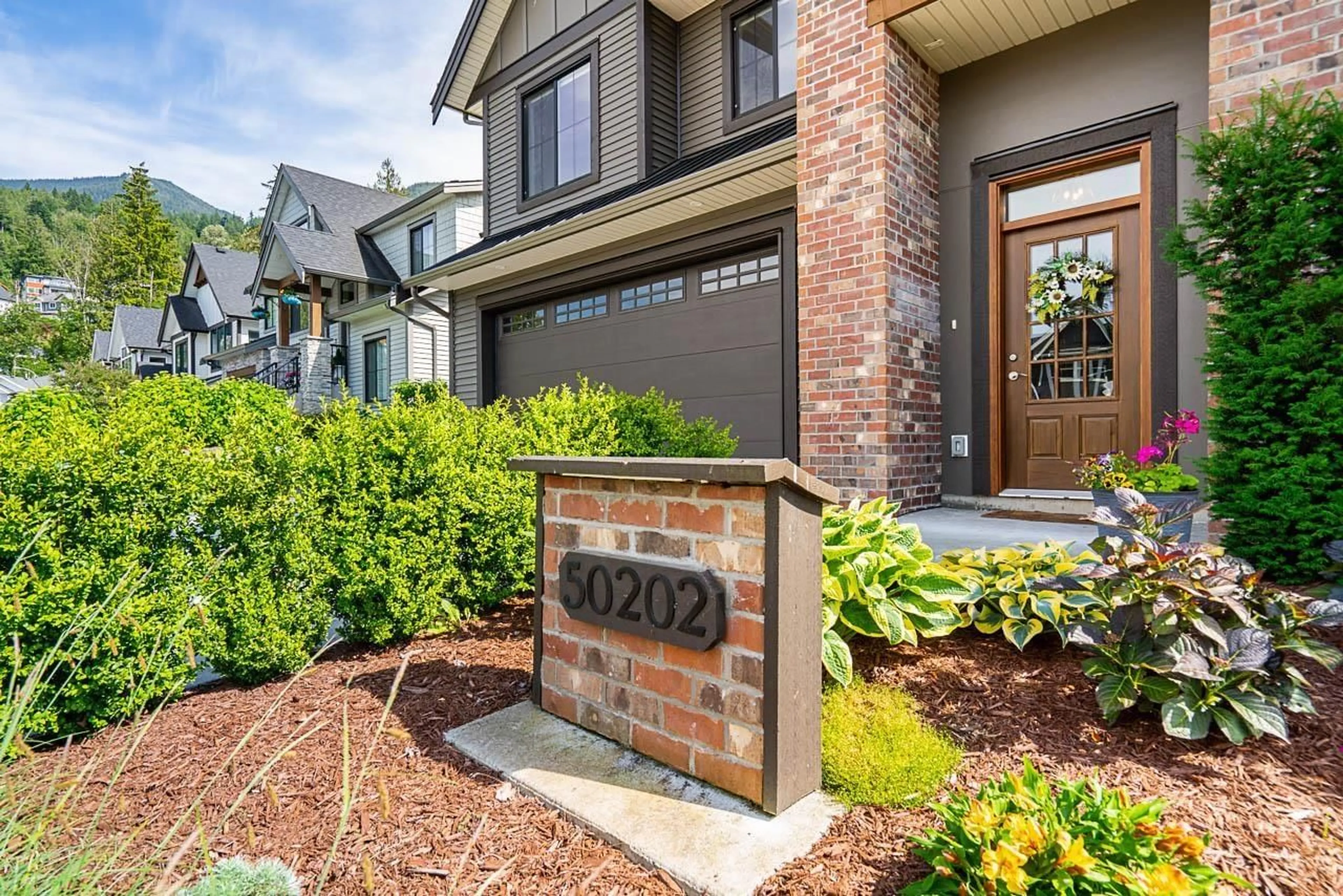 Home with brick exterior material, street for 50202 KENSINGTON DRIVE, Chilliwack British Columbia V4Z1J5