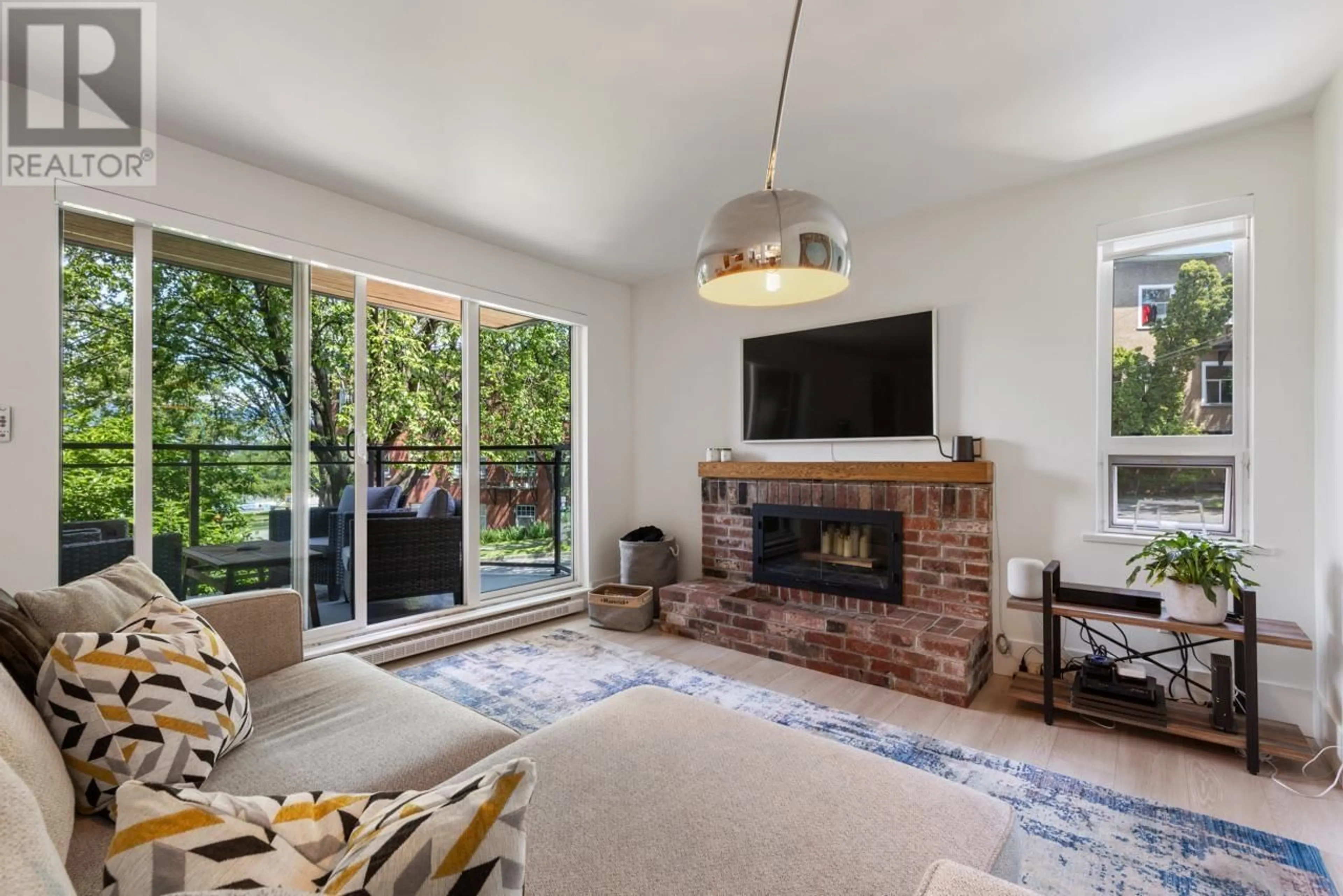 Living room with furniture, unknown for 204 - 2410 CORNWALL AVENUE, Vancouver British Columbia V6K1B8