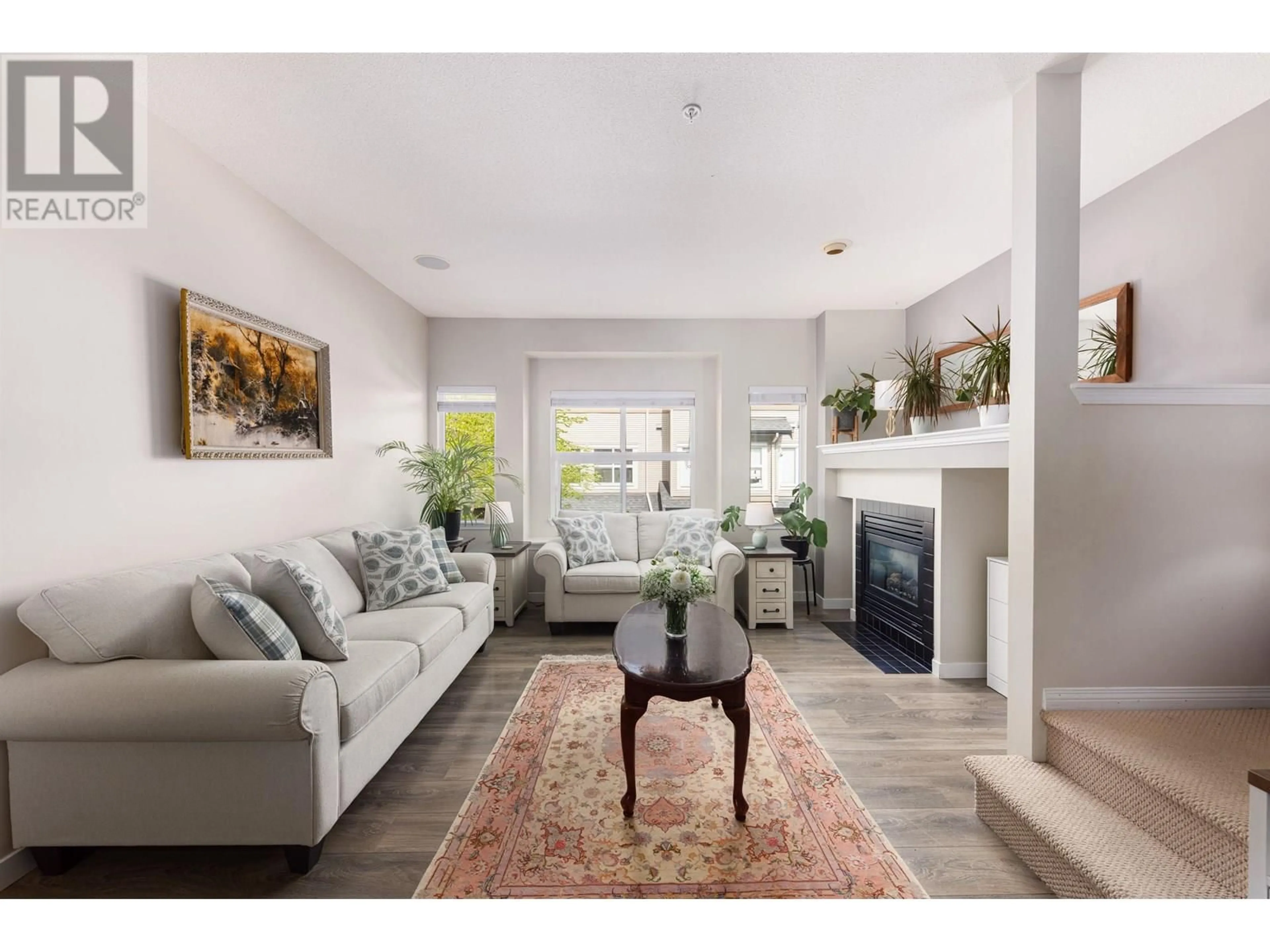 Living room with furniture, unknown for 102 - 1055 RIVERWOOD GATE, Port Coquitlam British Columbia V3B8C3