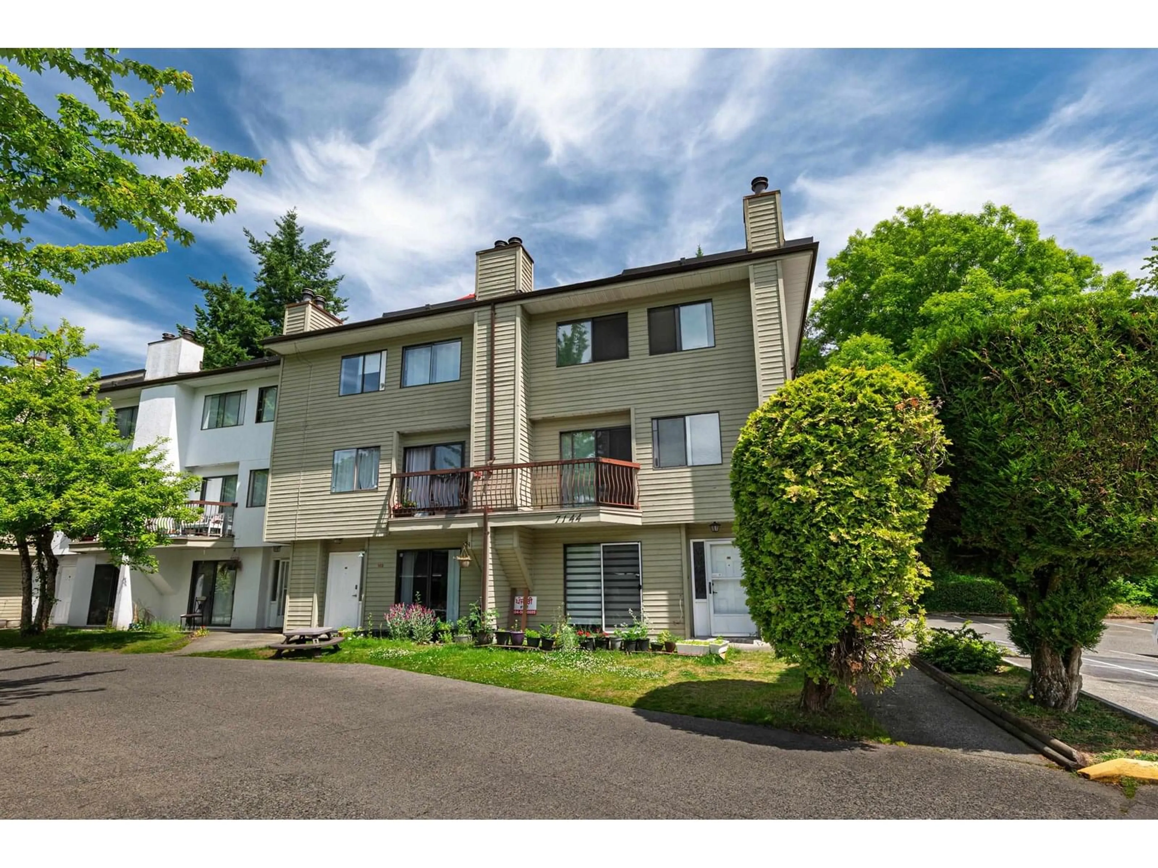 A pic from outside/outdoor area/front of a property/back of a property/a pic from drone, street for 210 - 7144 133B, Surrey British Columbia V3W8A4