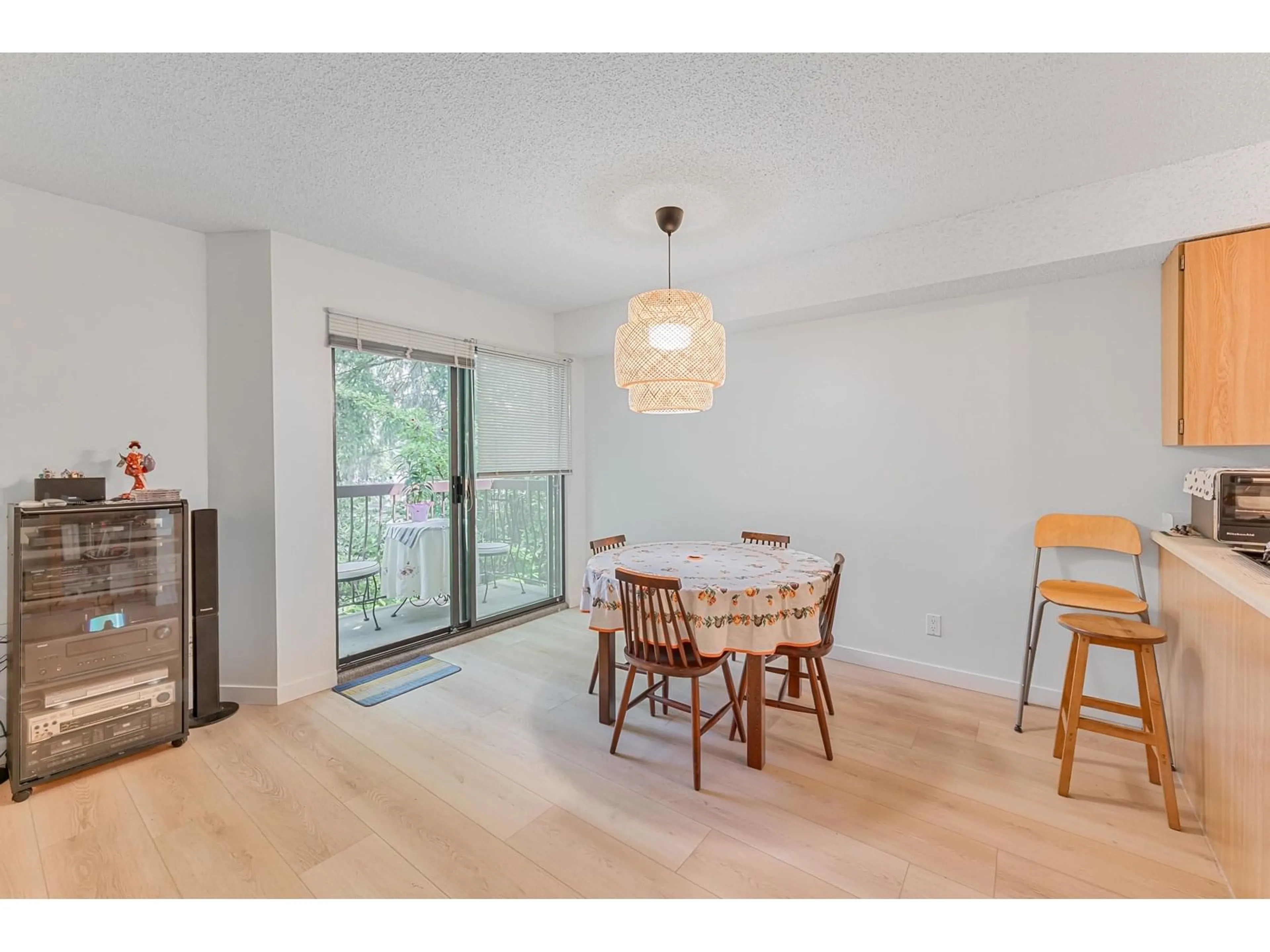 Dining room, wood/laminate floor for 210 - 7144 133B, Surrey British Columbia V3W8A4