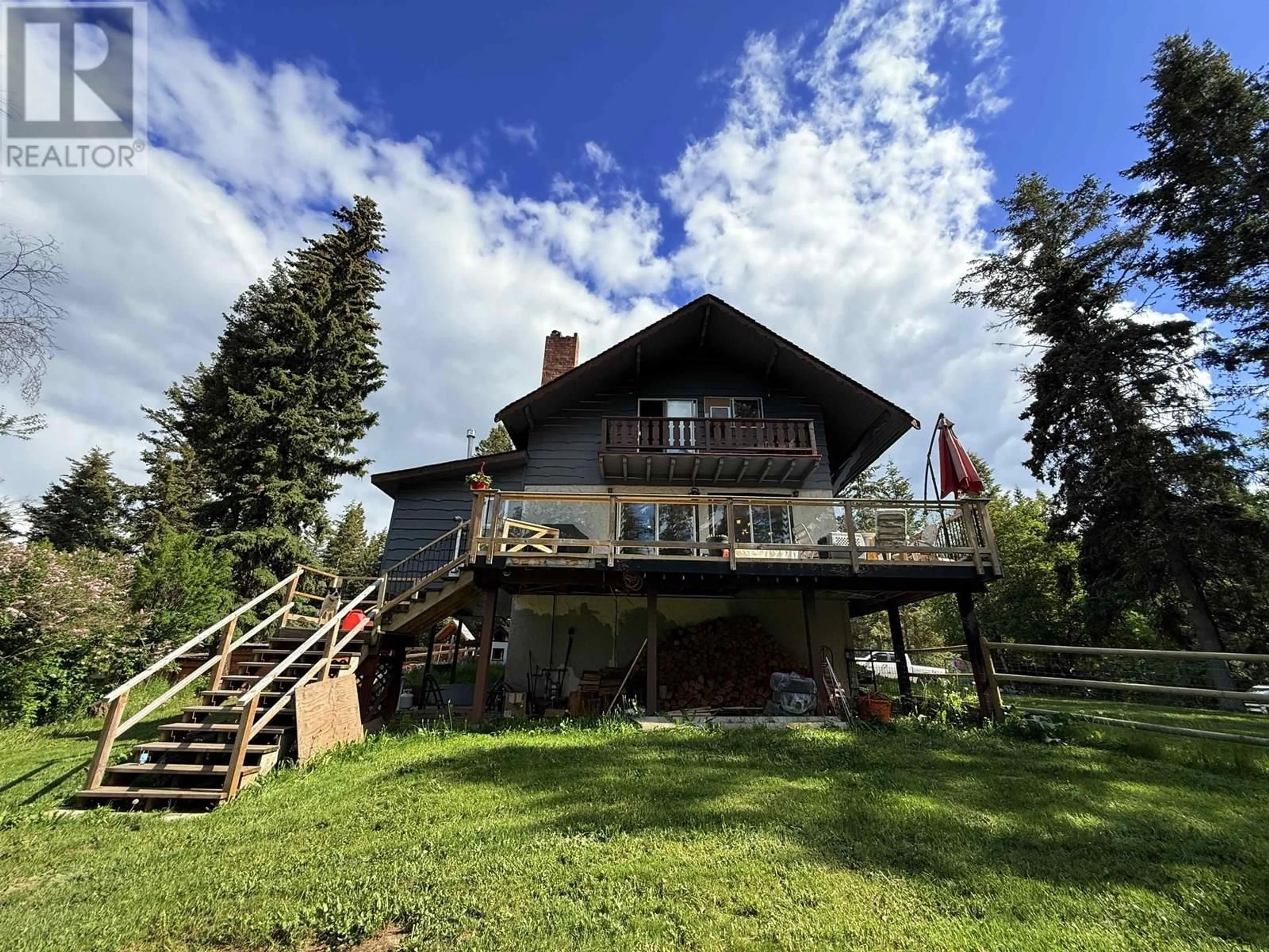 A pic from outside/outdoor area/front of a property/back of a property/a pic from drone, unknown for 4975 PLATEAU ROAD, 108 Mile Ranch British Columbia V0K2Z0