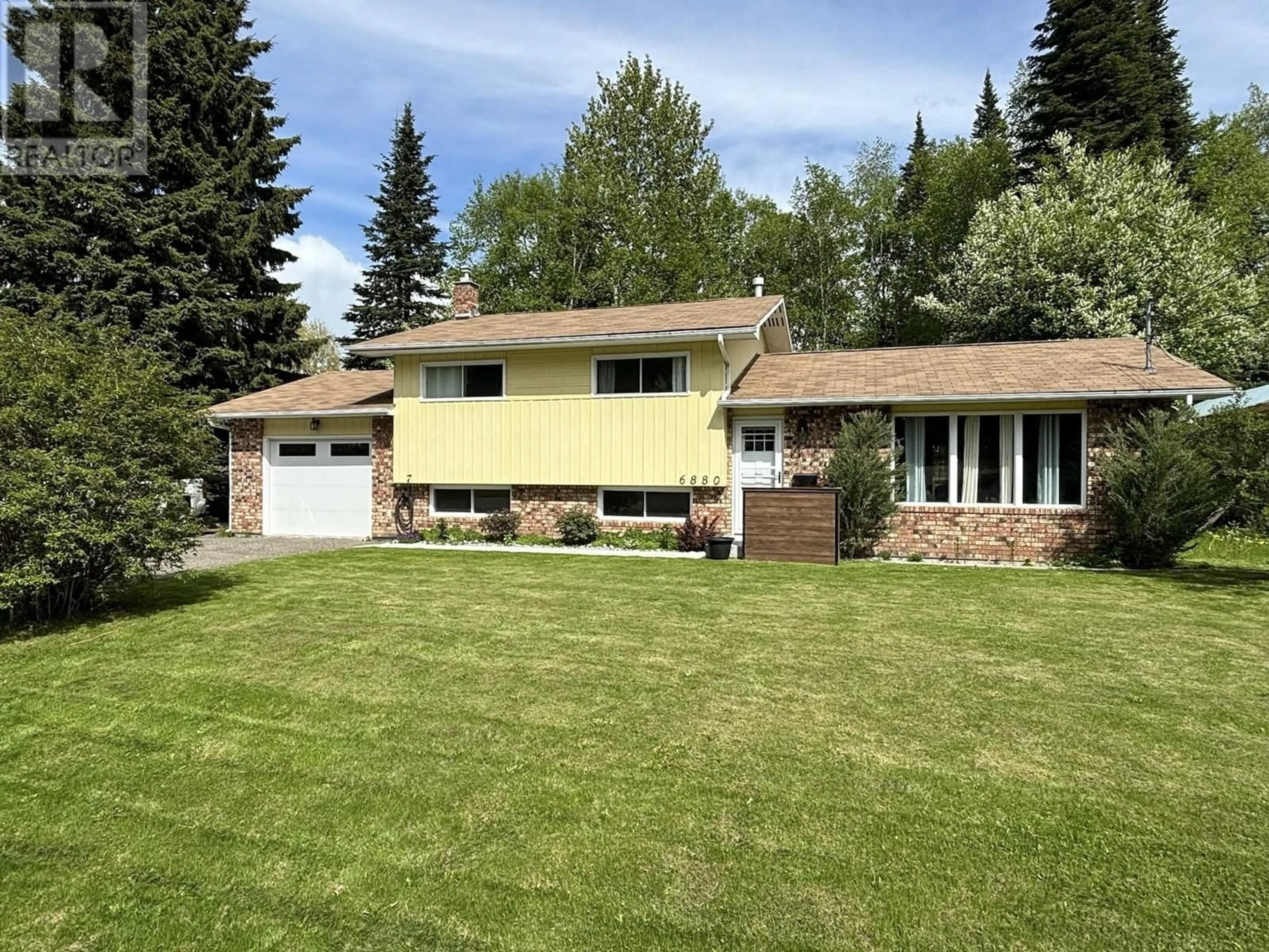A pic from outside/outdoor area/front of a property/back of a property/a pic from drone, street for 6880 LILAC CRESCENT, Prince George British Columbia V2K3G8