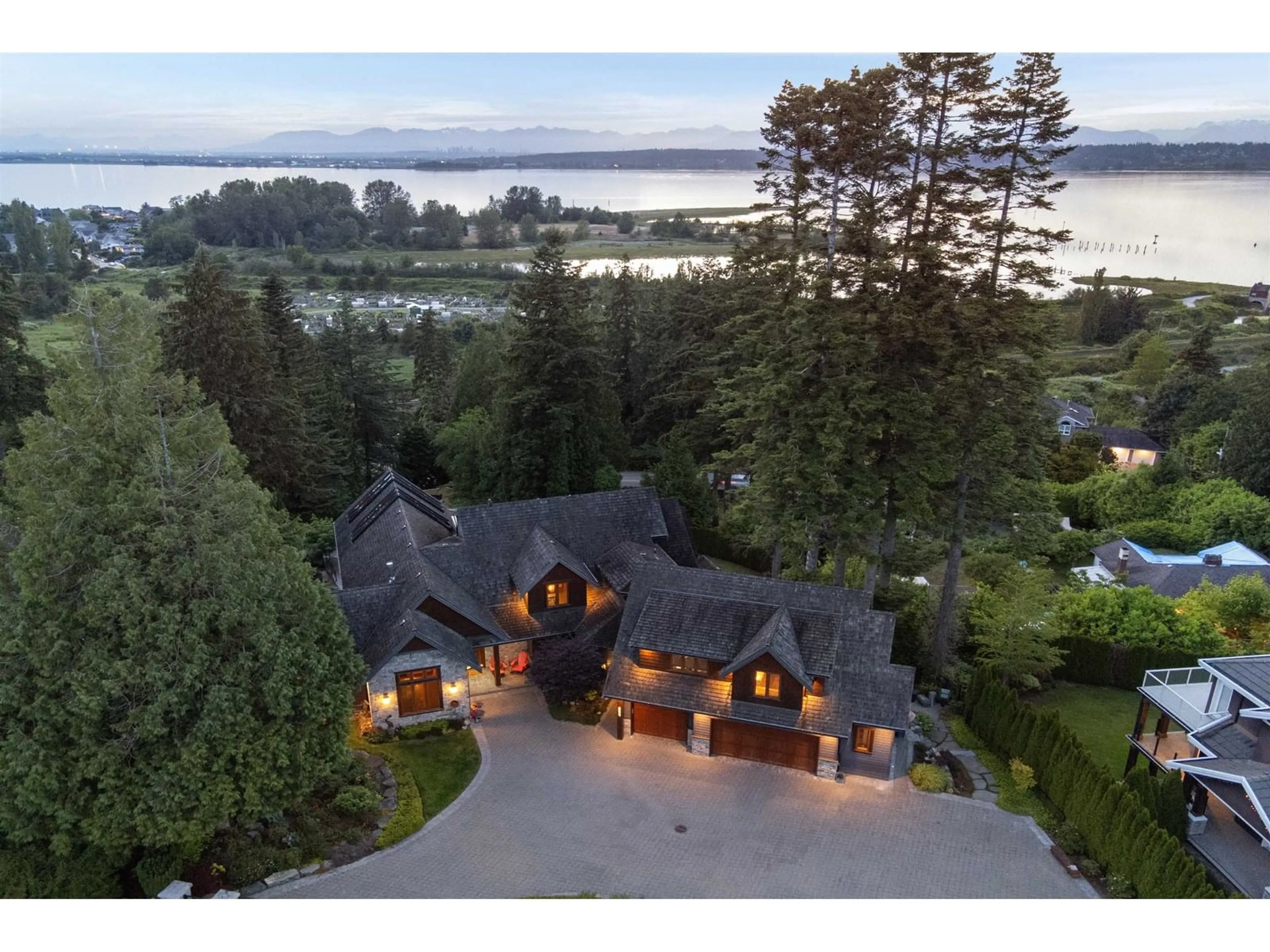 A pic from outside/outdoor area/front of a property/back of a property/a pic from drone, water/lake/river/ocean view for 12503 28, Surrey British Columbia V4A2N8