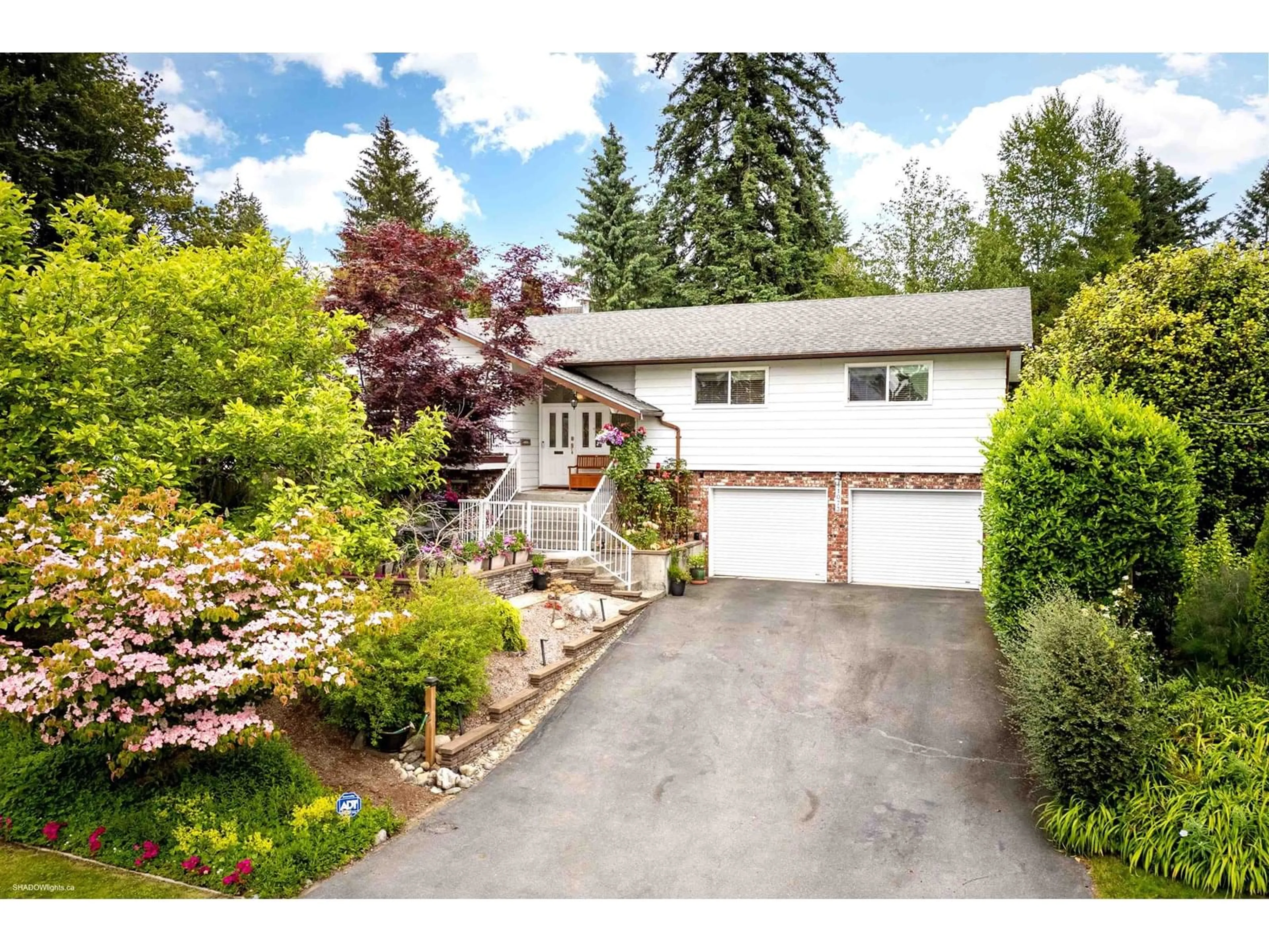 Home with vinyl exterior material, street for 11073 LAWRIE, Delta British Columbia V4E1G8