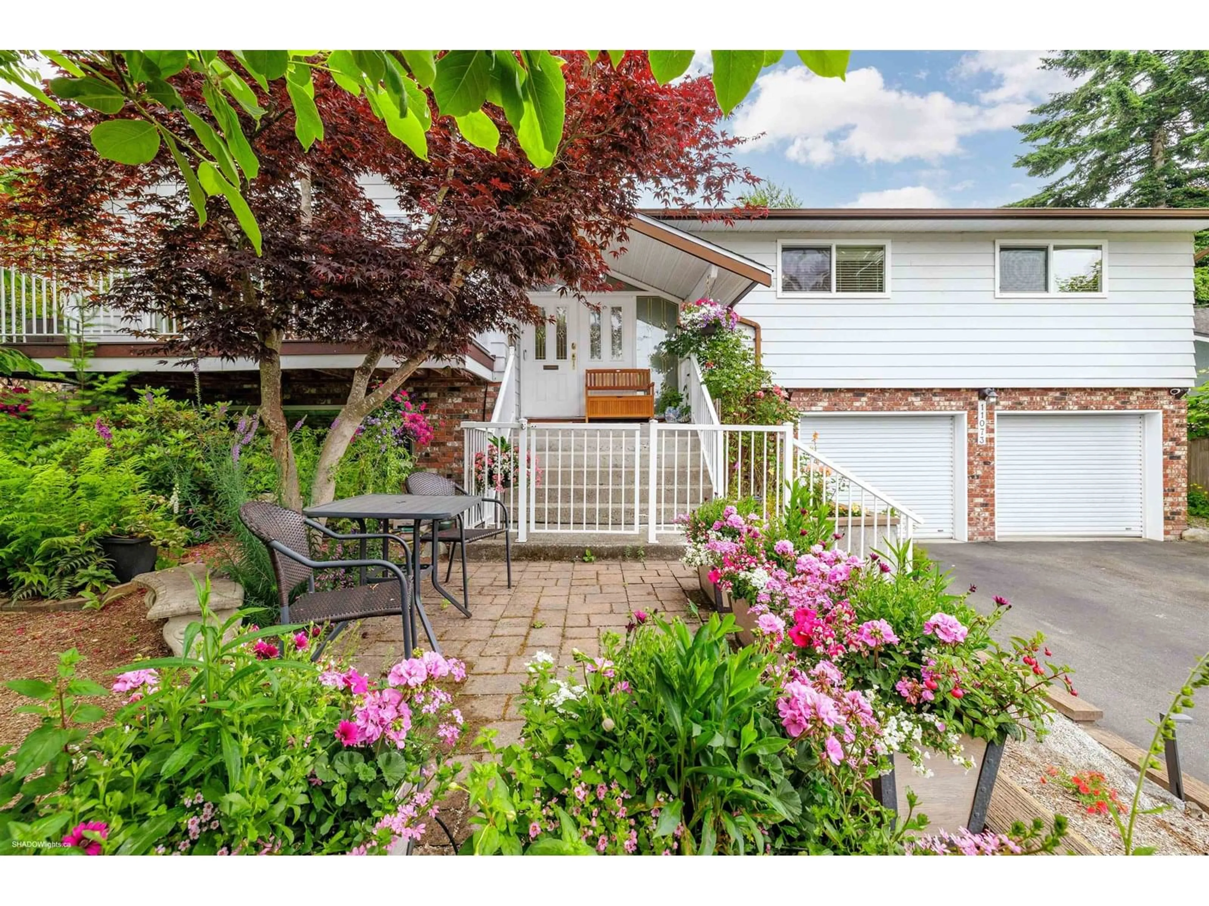 Home with vinyl exterior material, street for 11073 LAWRIE, Delta British Columbia V4E1G8
