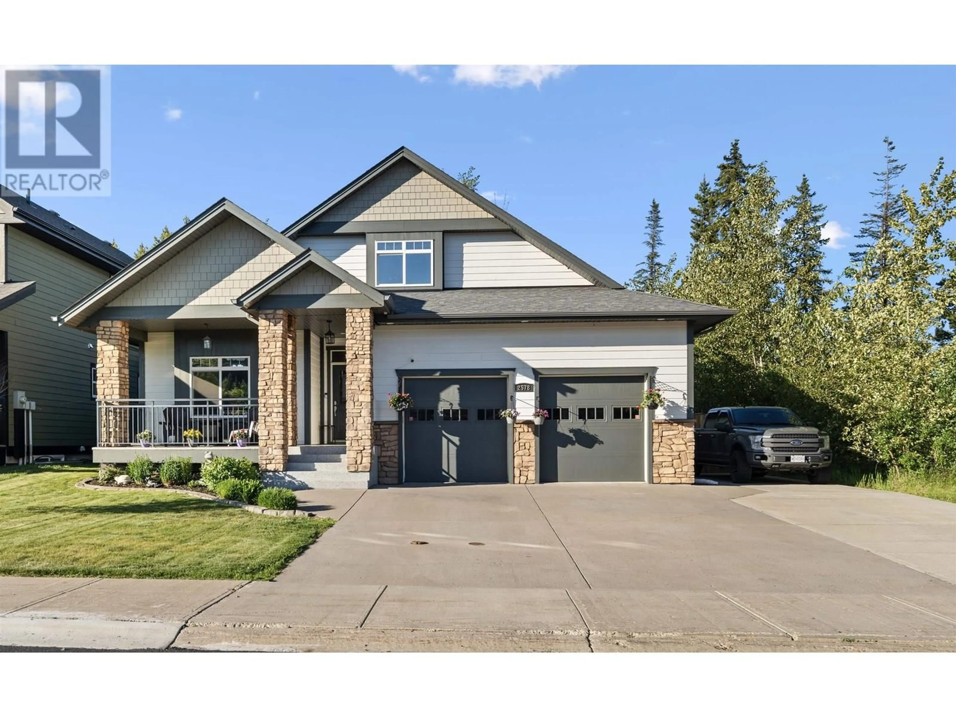 Home with brick exterior material, street for 2578 MAURICE DRIVE, Prince George British Columbia V2N0B9