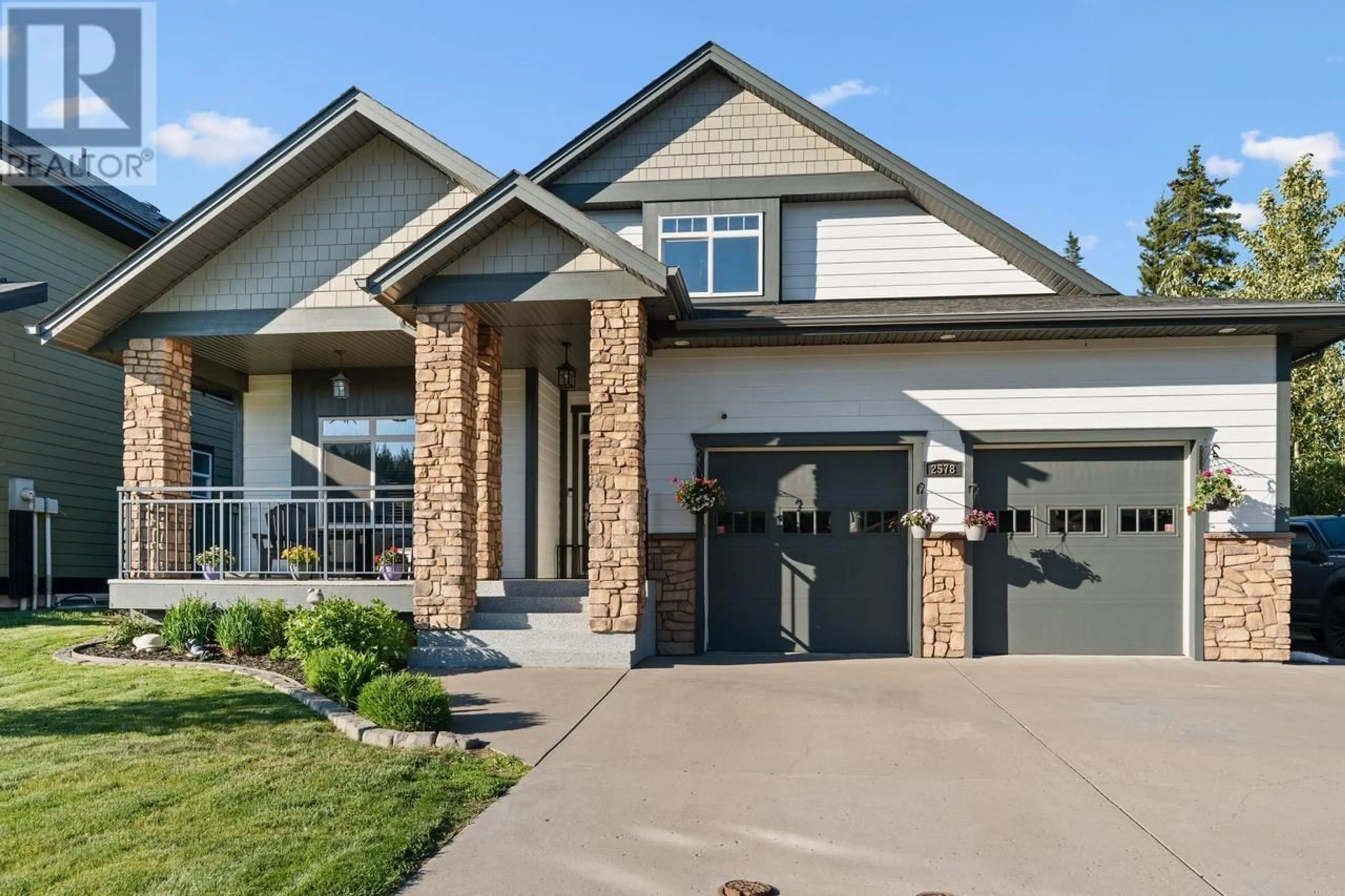 Home with brick exterior material, street for 2578 MAURICE DRIVE, Prince George British Columbia V2N0B9