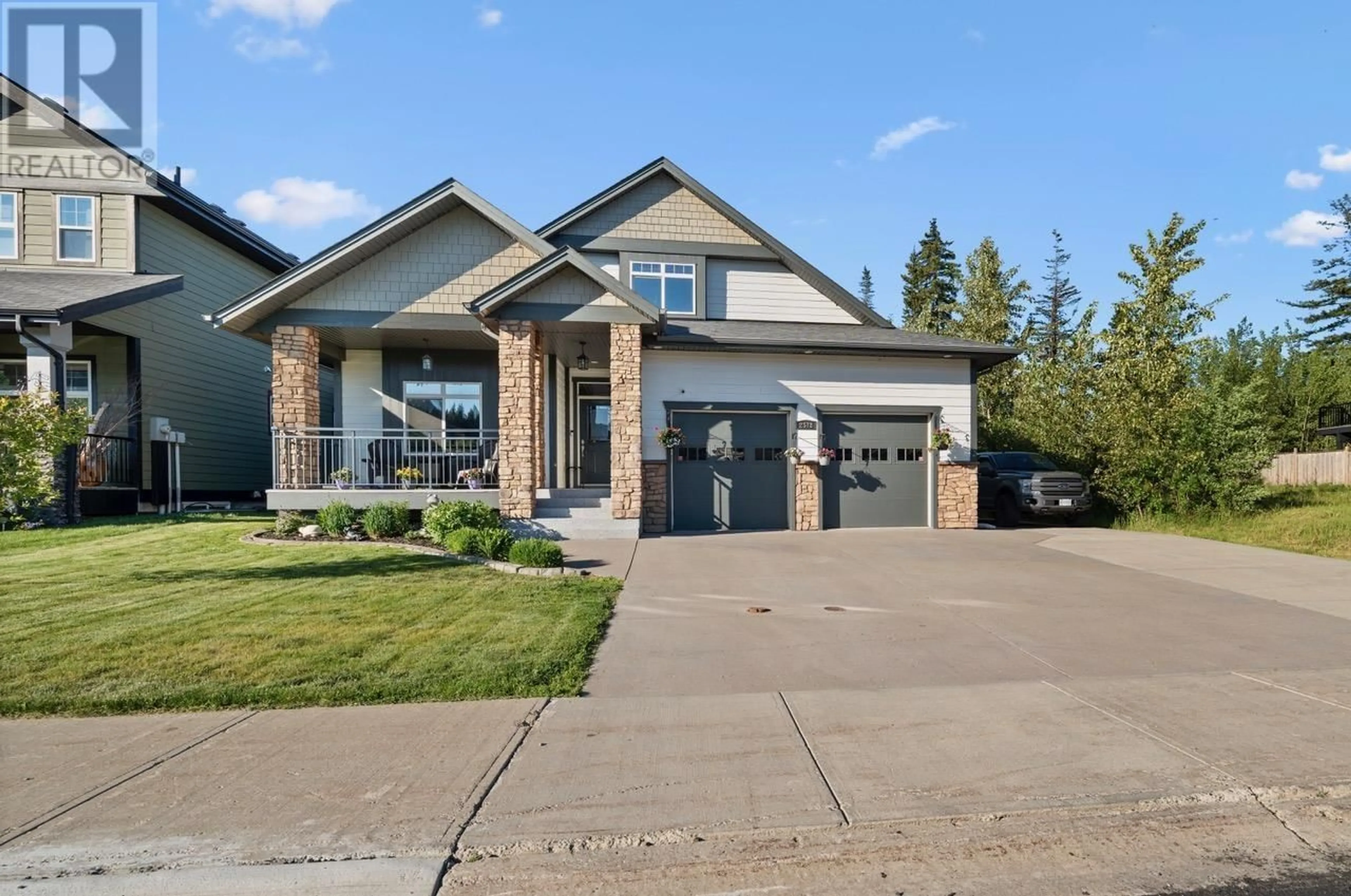 Home with brick exterior material, street for 2578 MAURICE DRIVE, Prince George British Columbia V2N0B9
