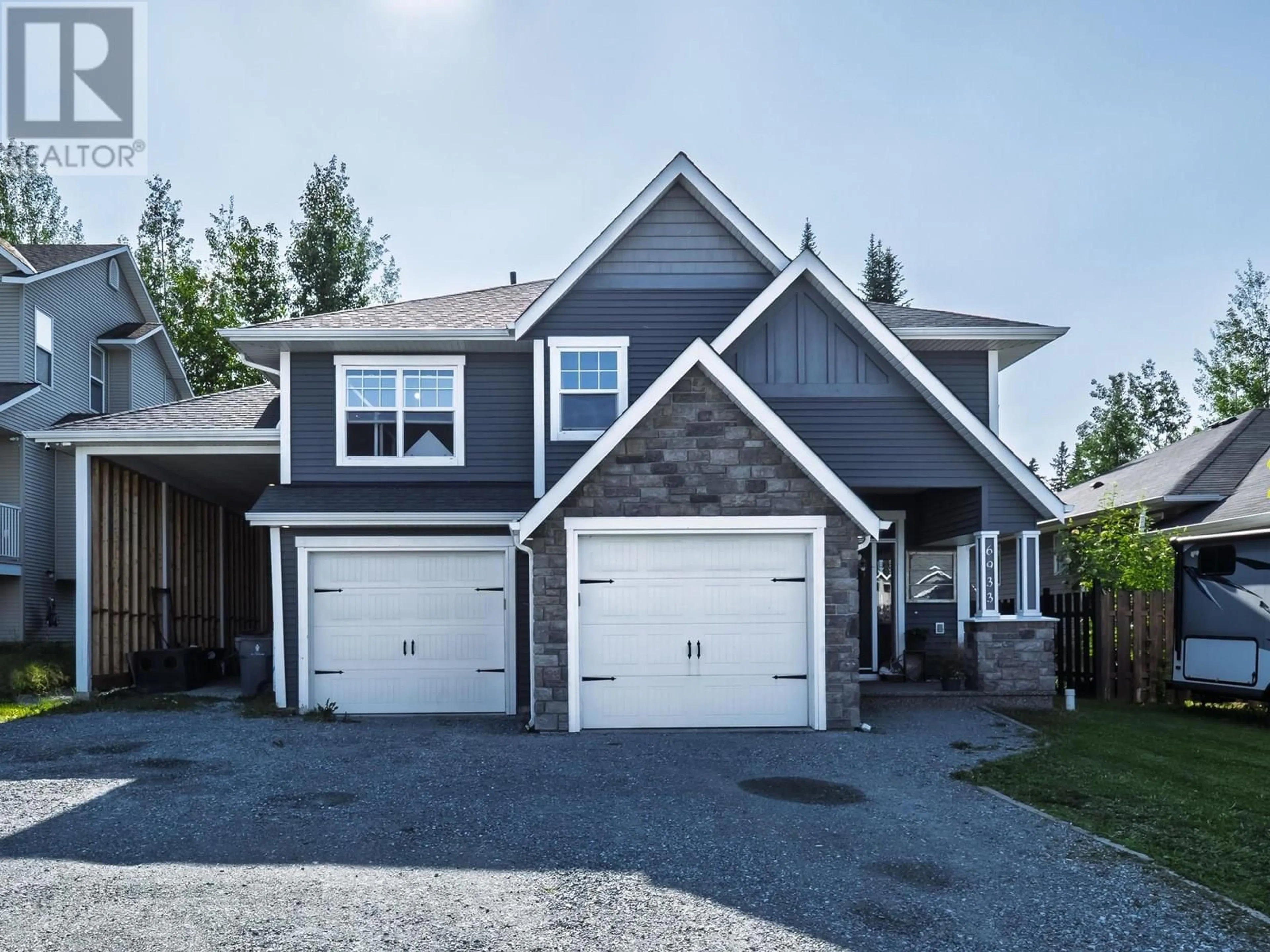Home with vinyl exterior material, street for 6933 EUGENE ROAD, Prince George British Columbia V2N5P6