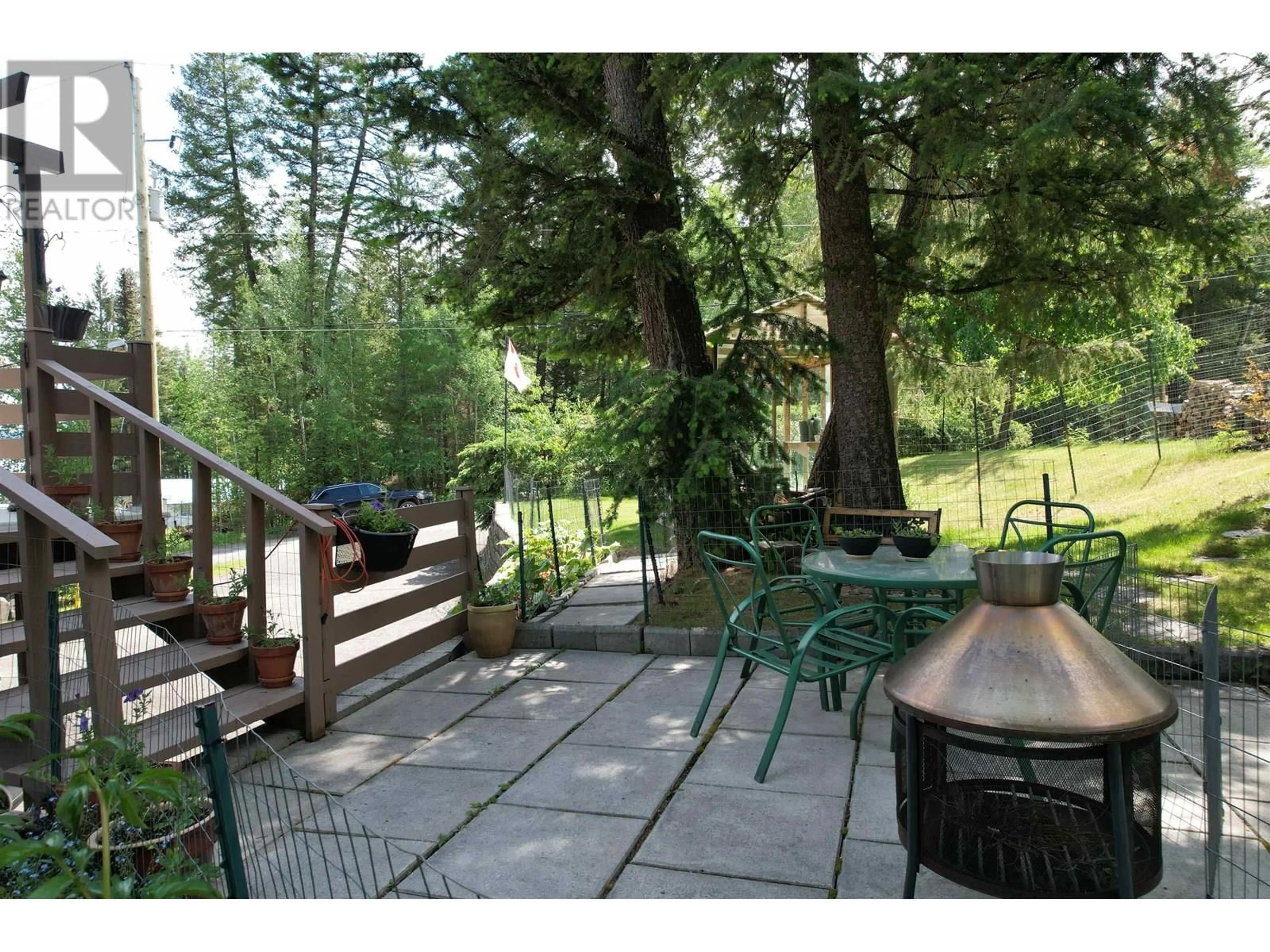 Patio, forest/trees view for 6472 EWEN ROAD, 100 Mile House British Columbia V0K2E3