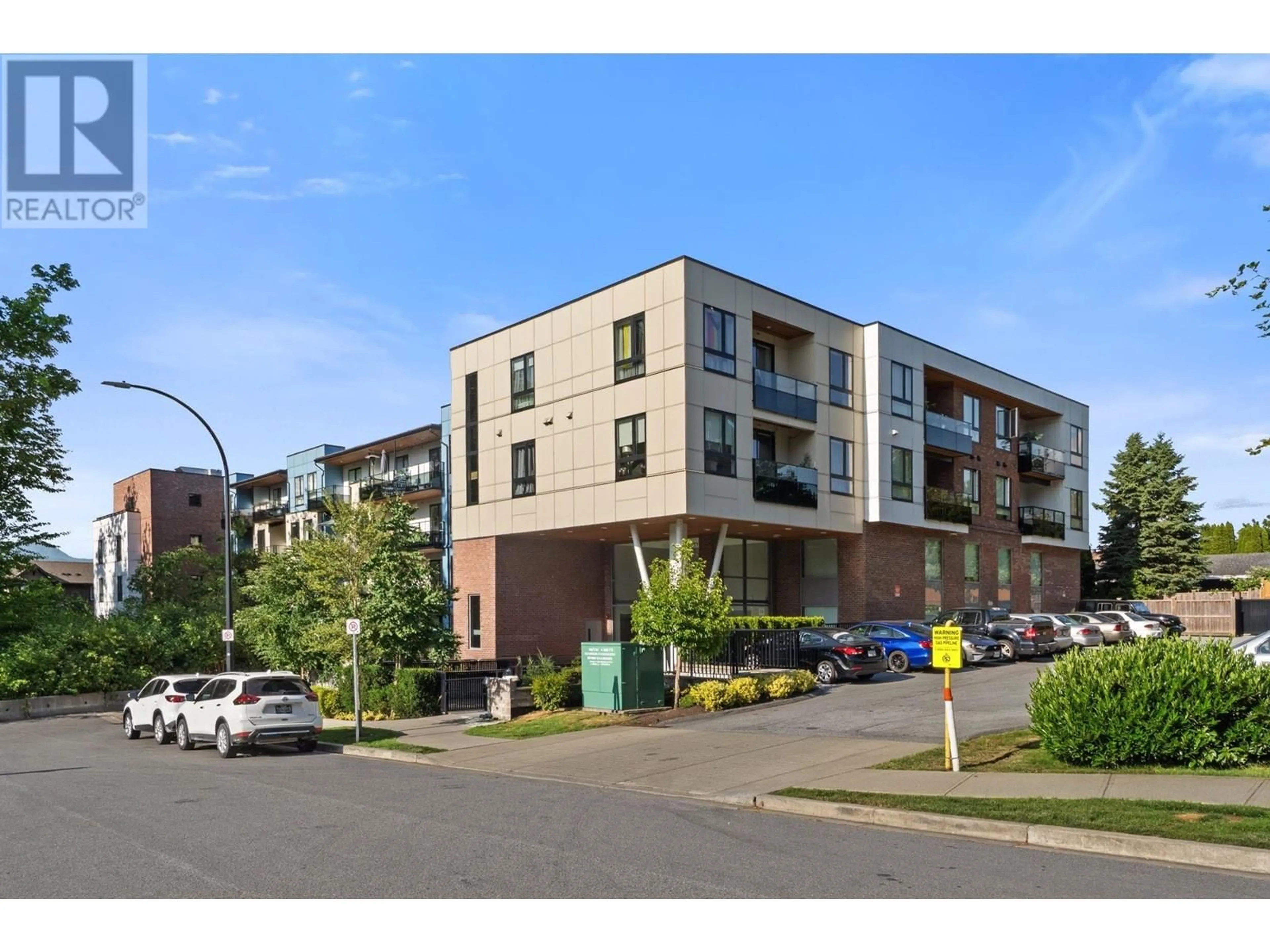A pic from outside/outdoor area/front of a property/back of a property/a pic from drone, street for PH14 - 12320 222 STREET, Maple Ridge British Columbia V2X4K8