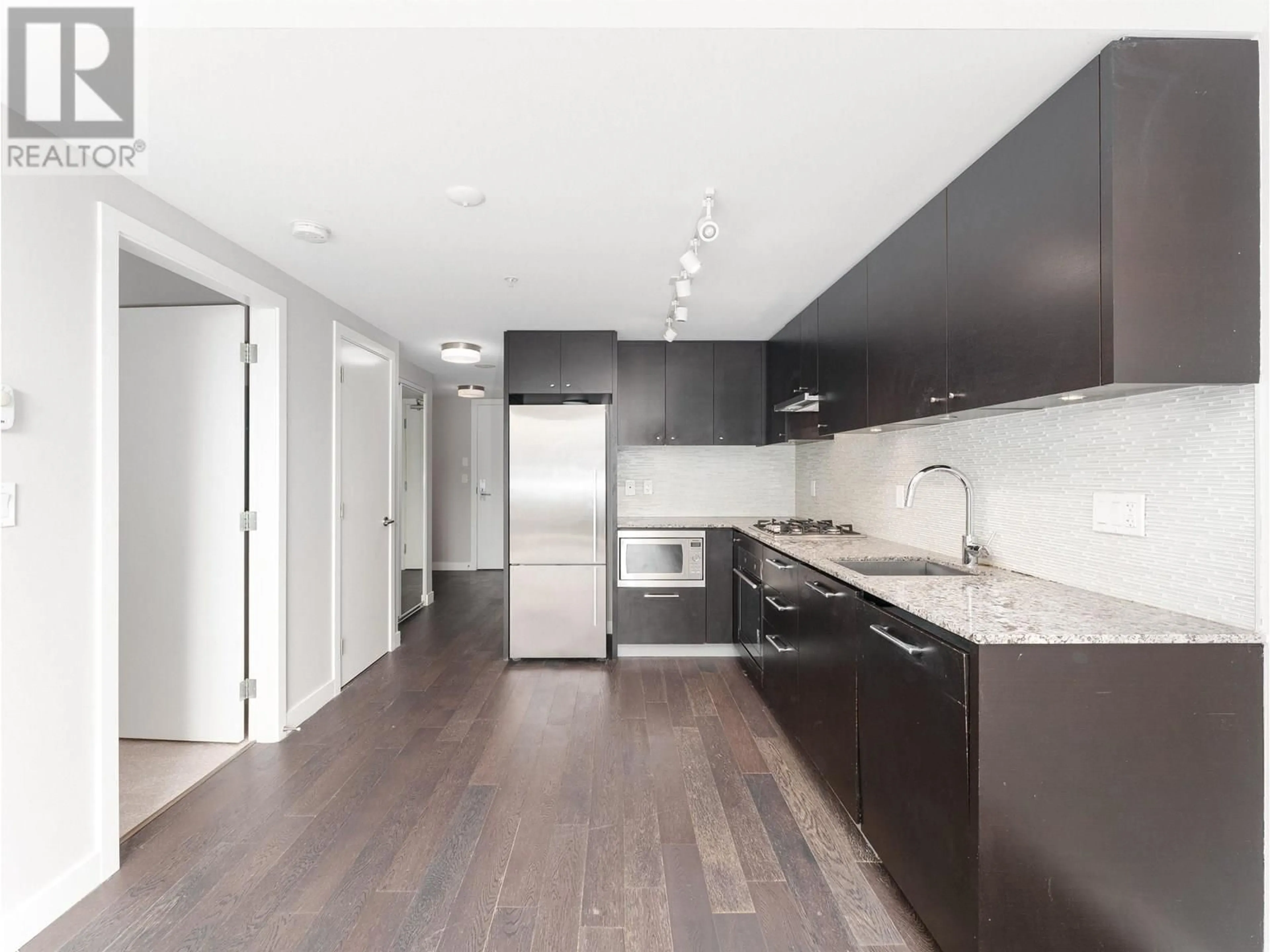 Open concept kitchen, unknown for 706 - 6180 COONEY ROAD, Richmond British Columbia V6Y0H2