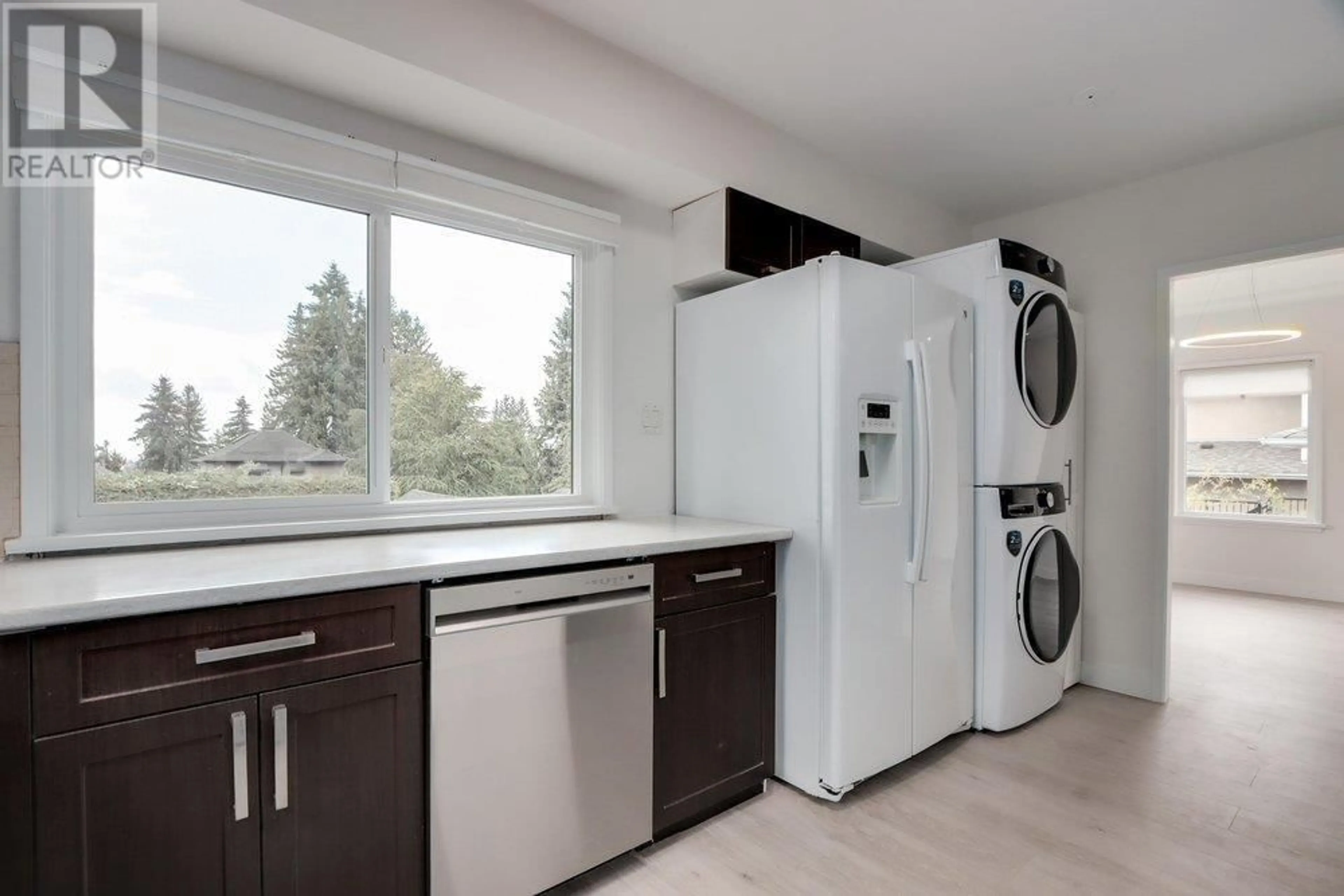 Kitchen with laundary machines, unknown for 181 WINDSOR ROAD, North Vancouver British Columbia V7N2M9