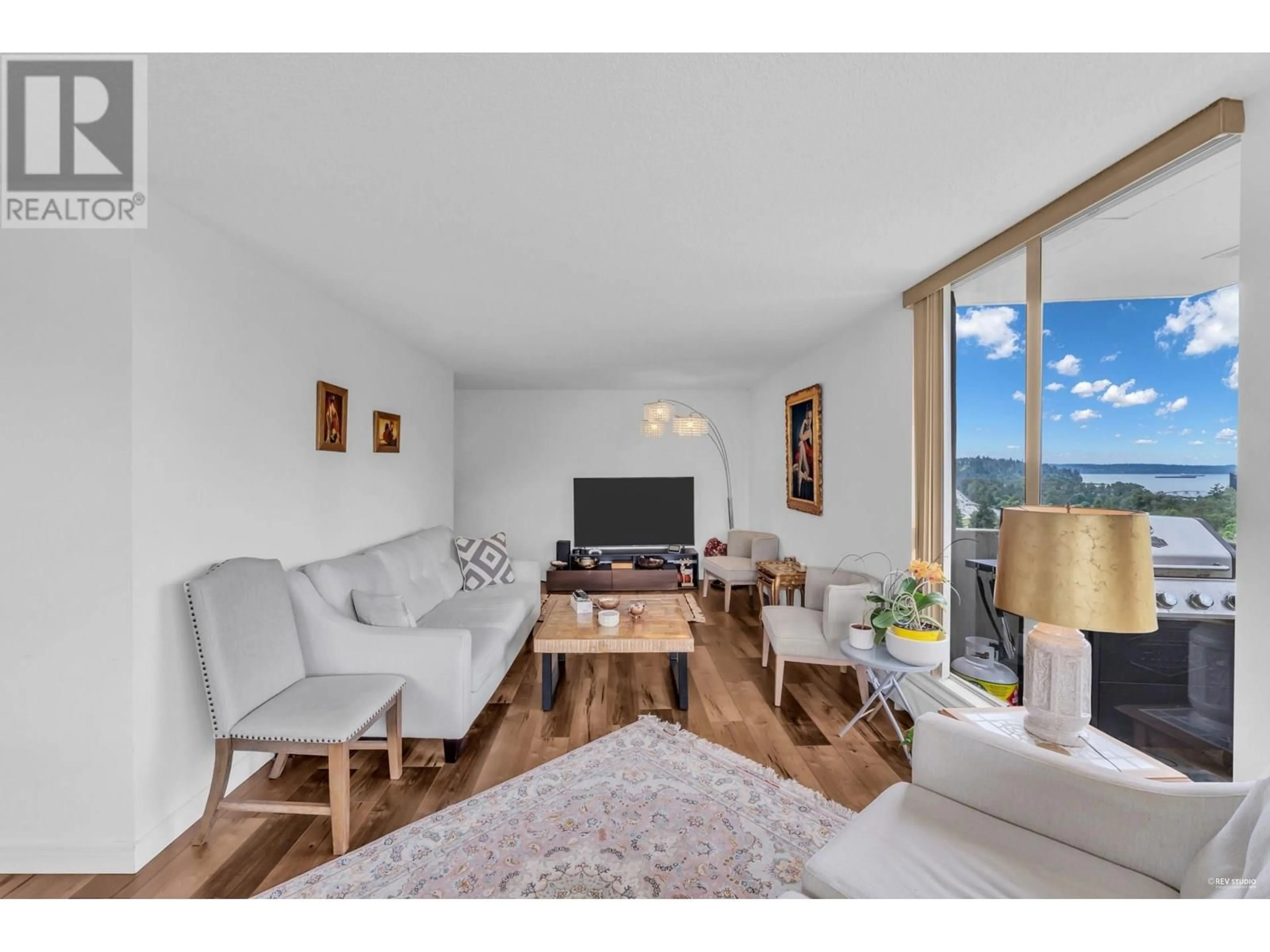 Living room with furniture, wood/laminate floor for 1404 - 2024 FULLERTON AVENUE, North Vancouver British Columbia V7P3G4